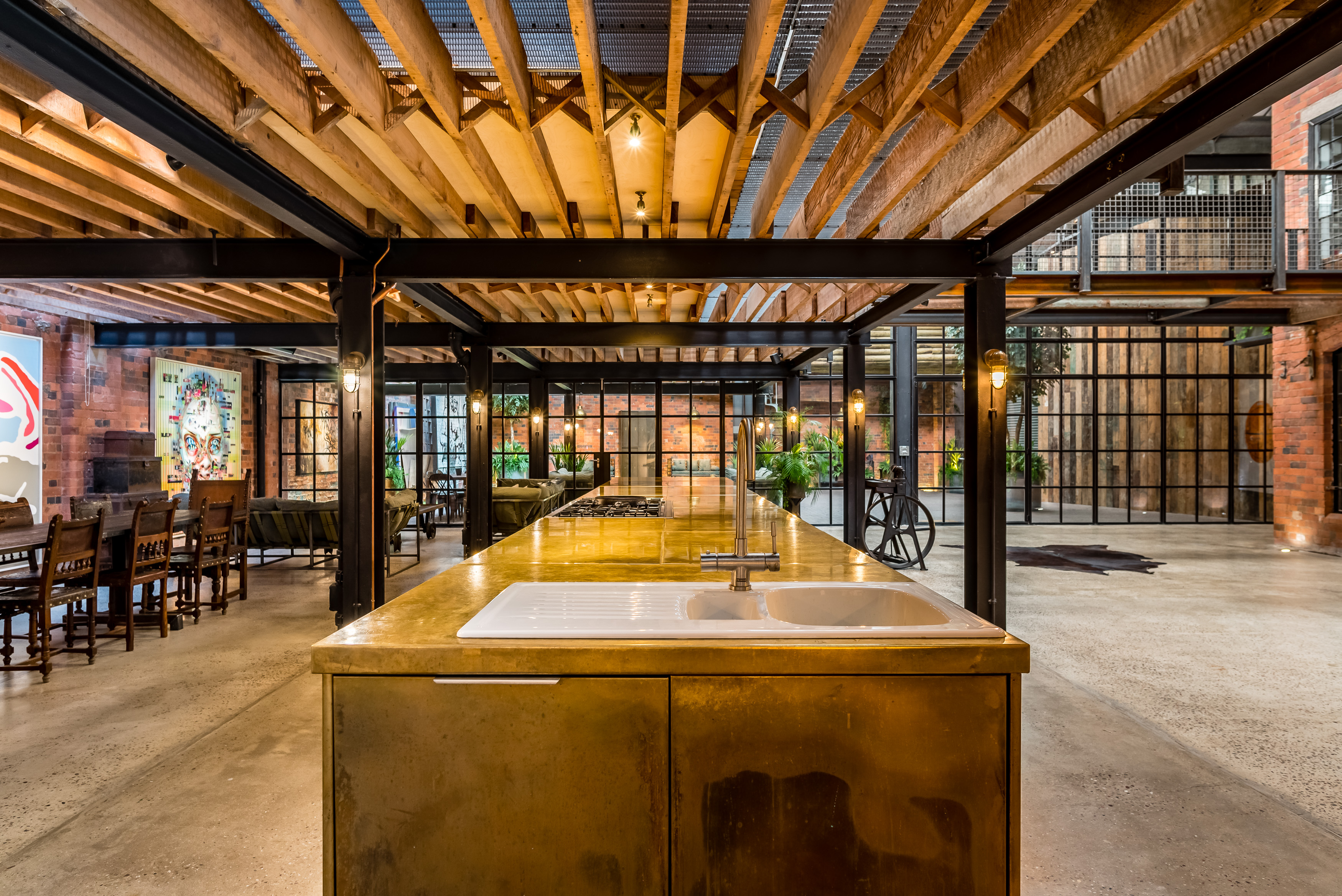 Modern event space with industrial design, perfect for corporate meetings and social gatherings.