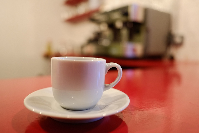 Espresso cup on saucer in Centrala Meeting room for networking events and refreshments.