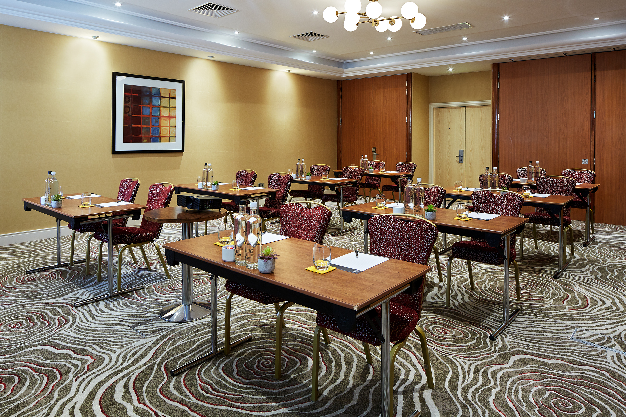 James Suite meeting room at The Rembrandt, modern decor for workshops and discussions.