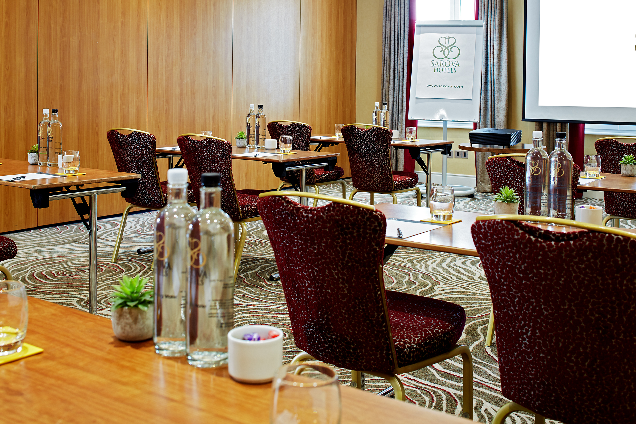 James Suite meeting room with modern decor, ideal for professional events and conferences.