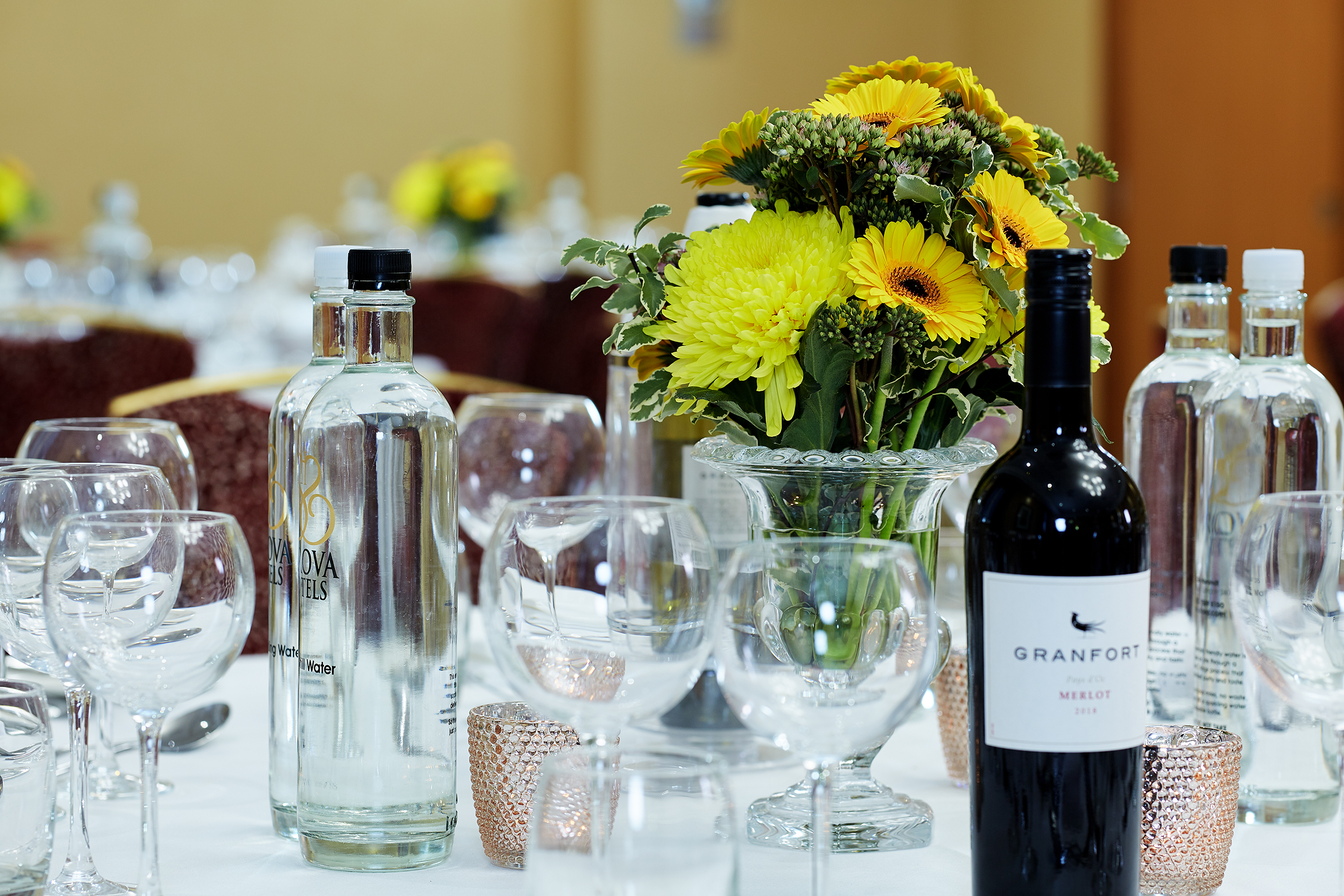 Elegant dining table setup for corporate event at Edward and Charles Suites, The Rembrandt.