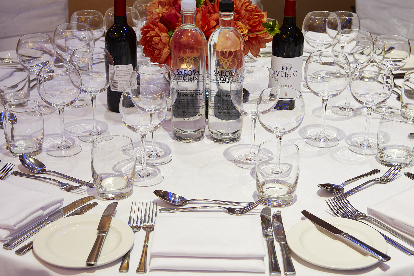 Elegant dining table setup at Charles and James Suites for formal events.