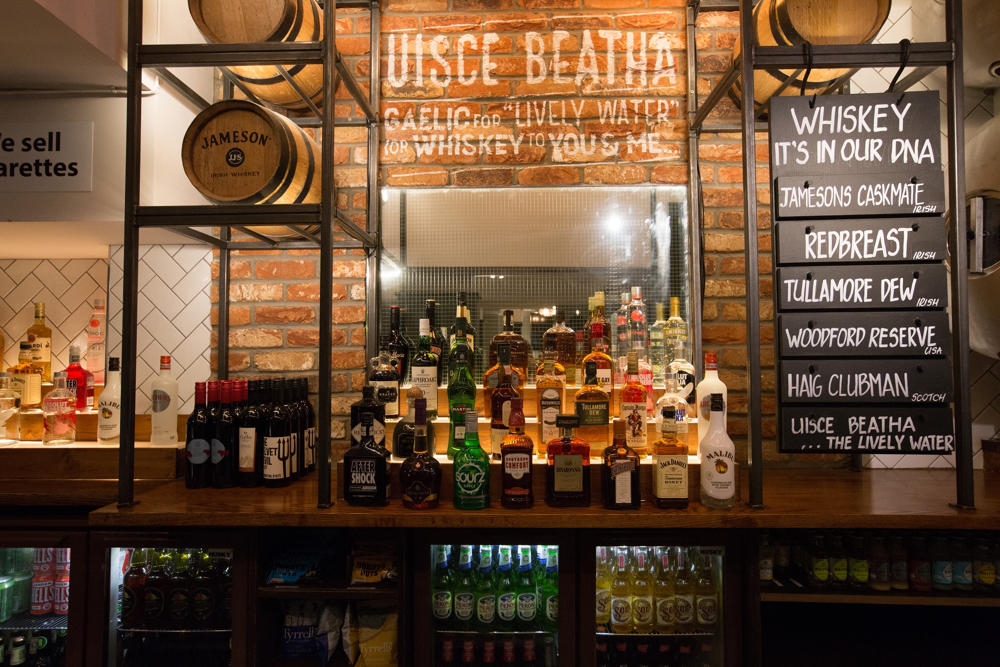 Ground Floor bar at O'Neill's Wardour Street, featuring whiskey selection for events.