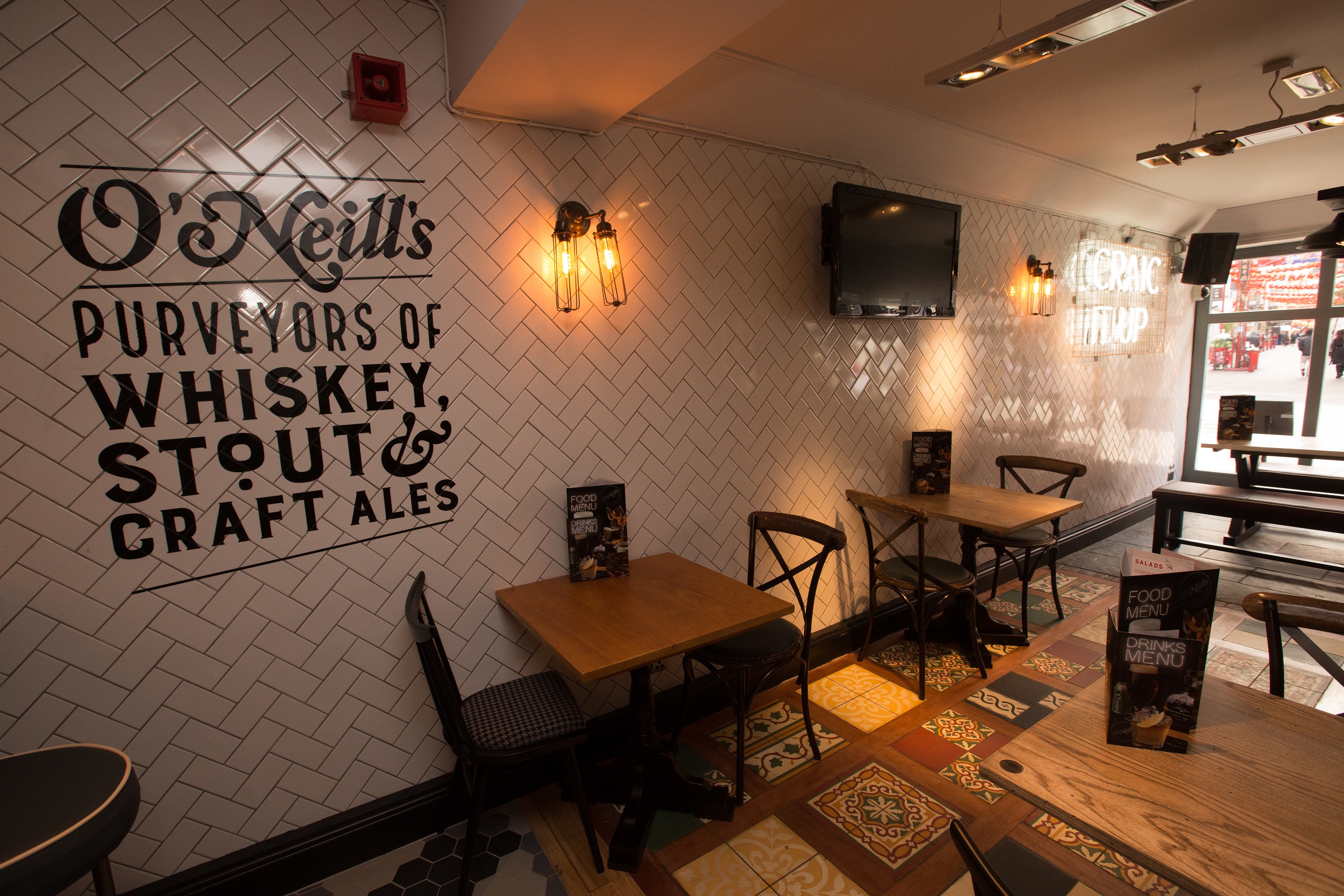 Cozy pub interior at O'Neill's Wardour Street, perfect for networking events and gatherings.