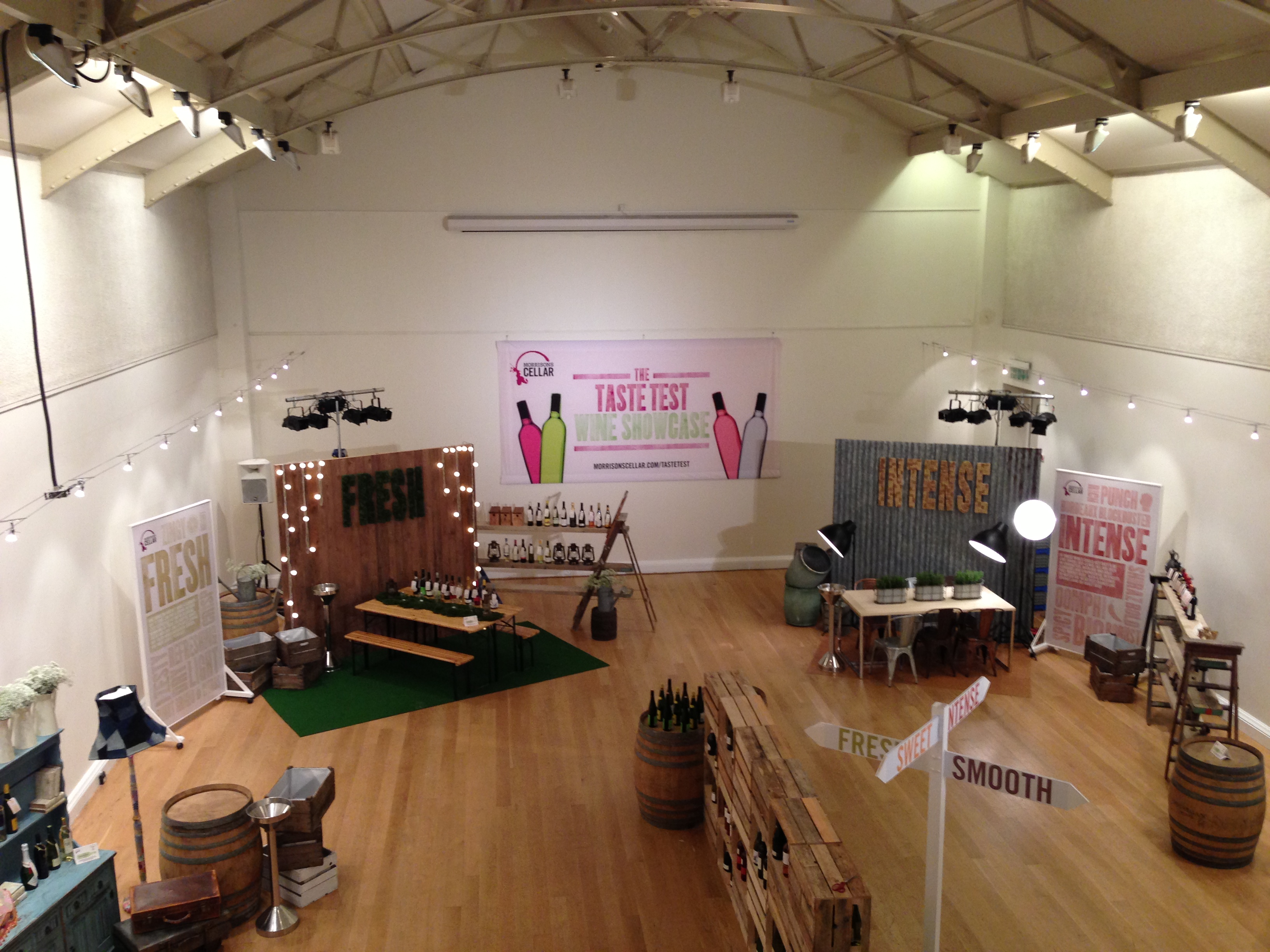 Great Hall at The Hellenic Centre set for a tasting event with inviting wooden decor.