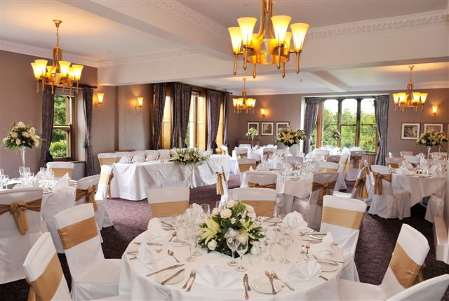 Elegant banquet hall at Nutfield Priory, perfect for weddings and formal events.