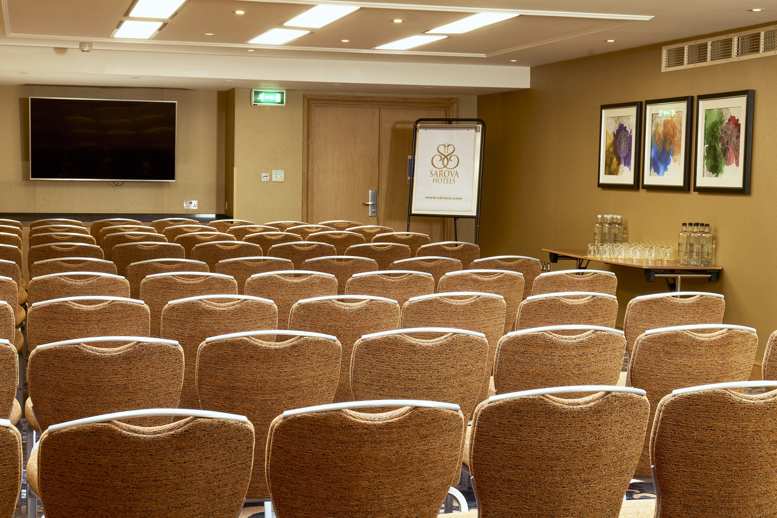 Buckingham Suite meeting room with arranged chairs, ideal for corporate events and presentations.