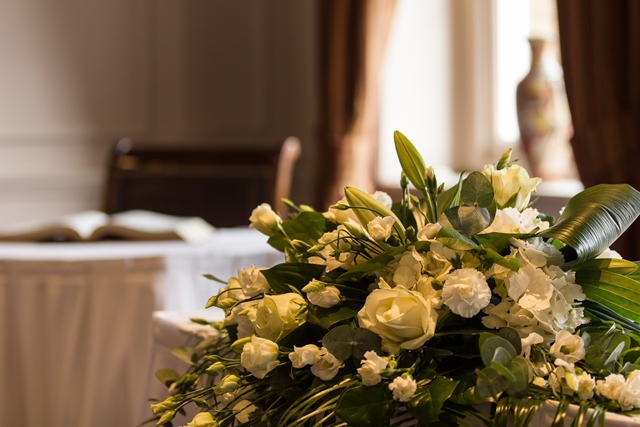 Elegant floral centerpiece in Presidents lounge, Crathorne Hall Hotel for weddings and events.