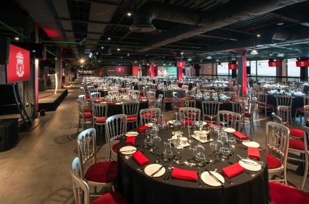Carlsberg Dugout at Liverpool FC, elegant dinner setup for corporate events.