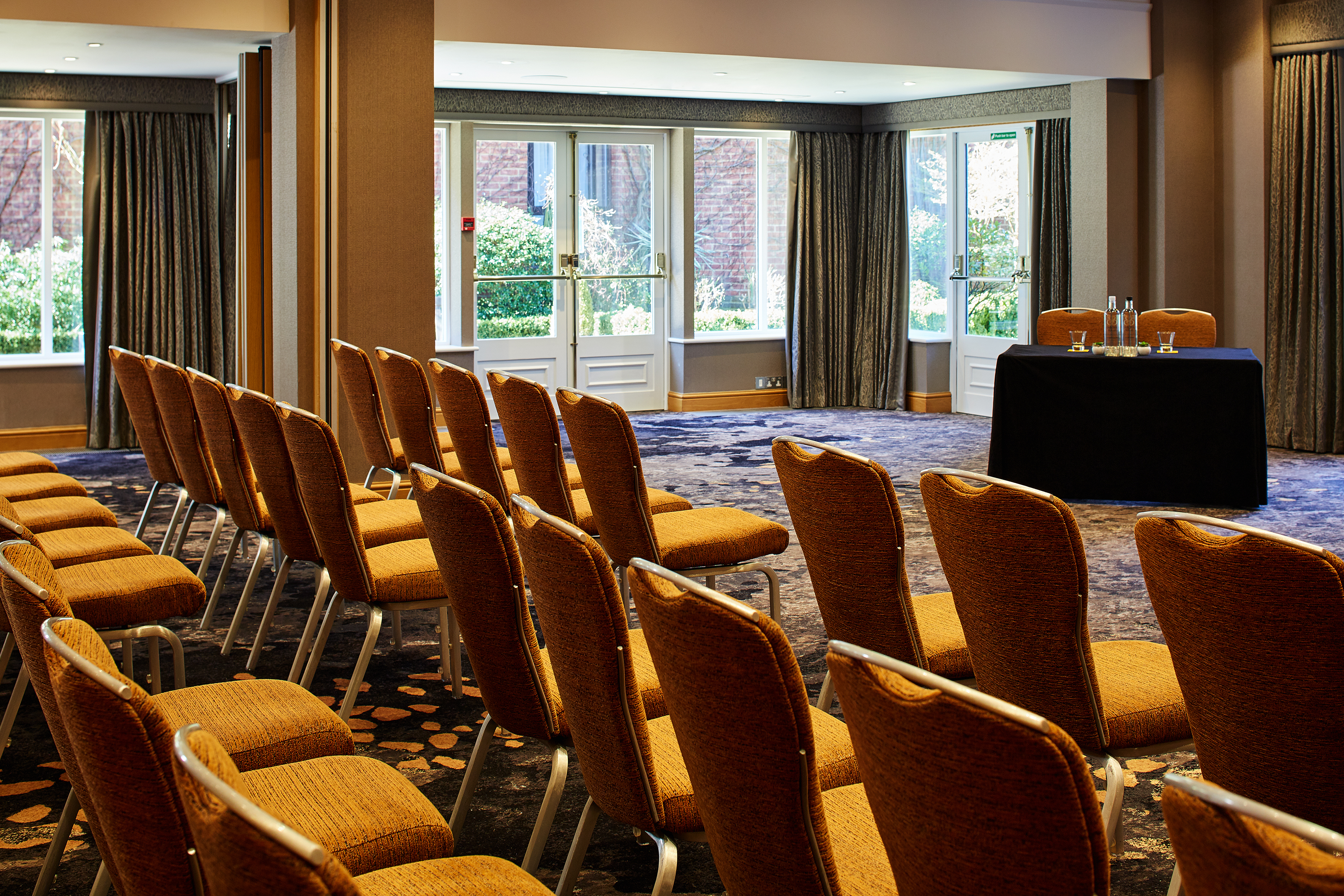 Thames Suite meeting room at The Bull Hotel, bright and inviting for presentations.