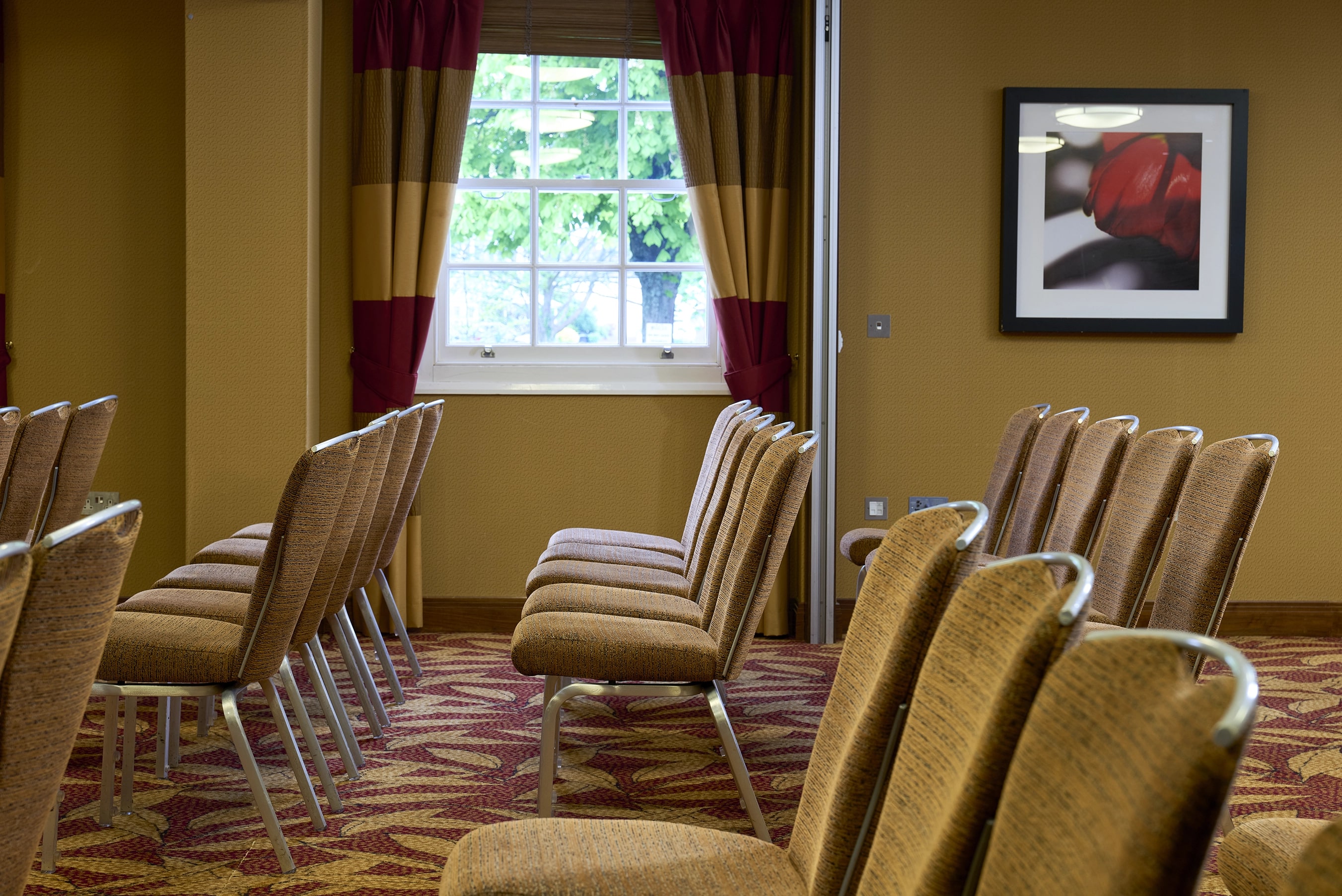 Chalfont Suite meeting space with aligned chairs, ideal for corporate events and workshops.