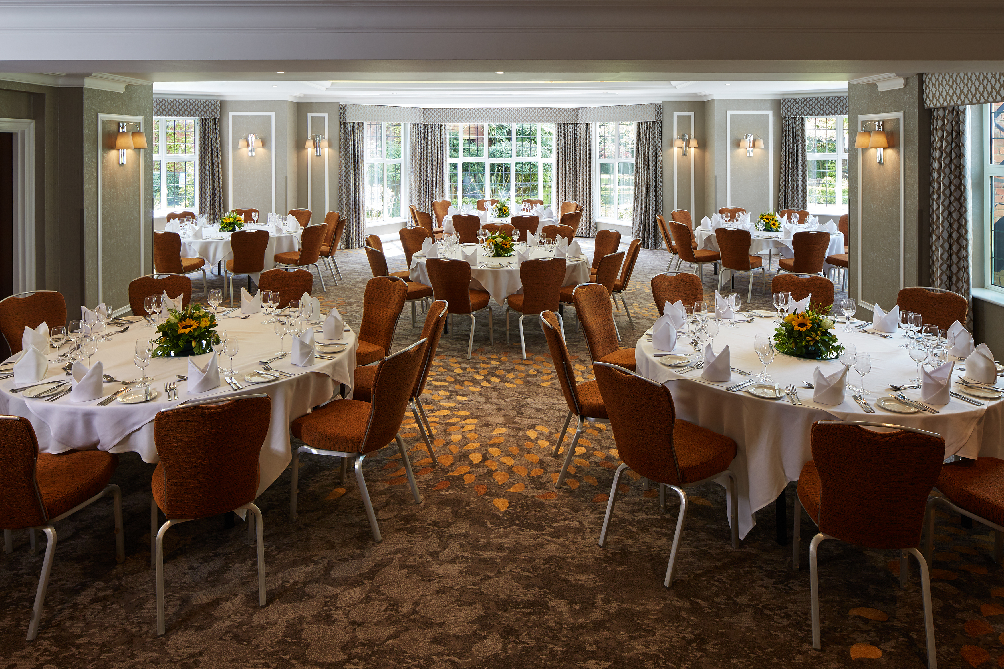 Elegant banquet room in Bulstrode Suite, ideal for corporate events and formal dinners.