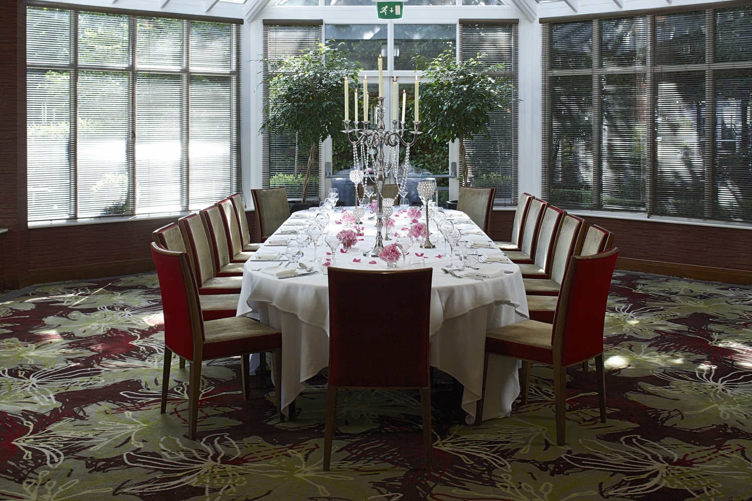 Elegant dining table in The Bull Hotel's Garden Room for upscale events and meetings.