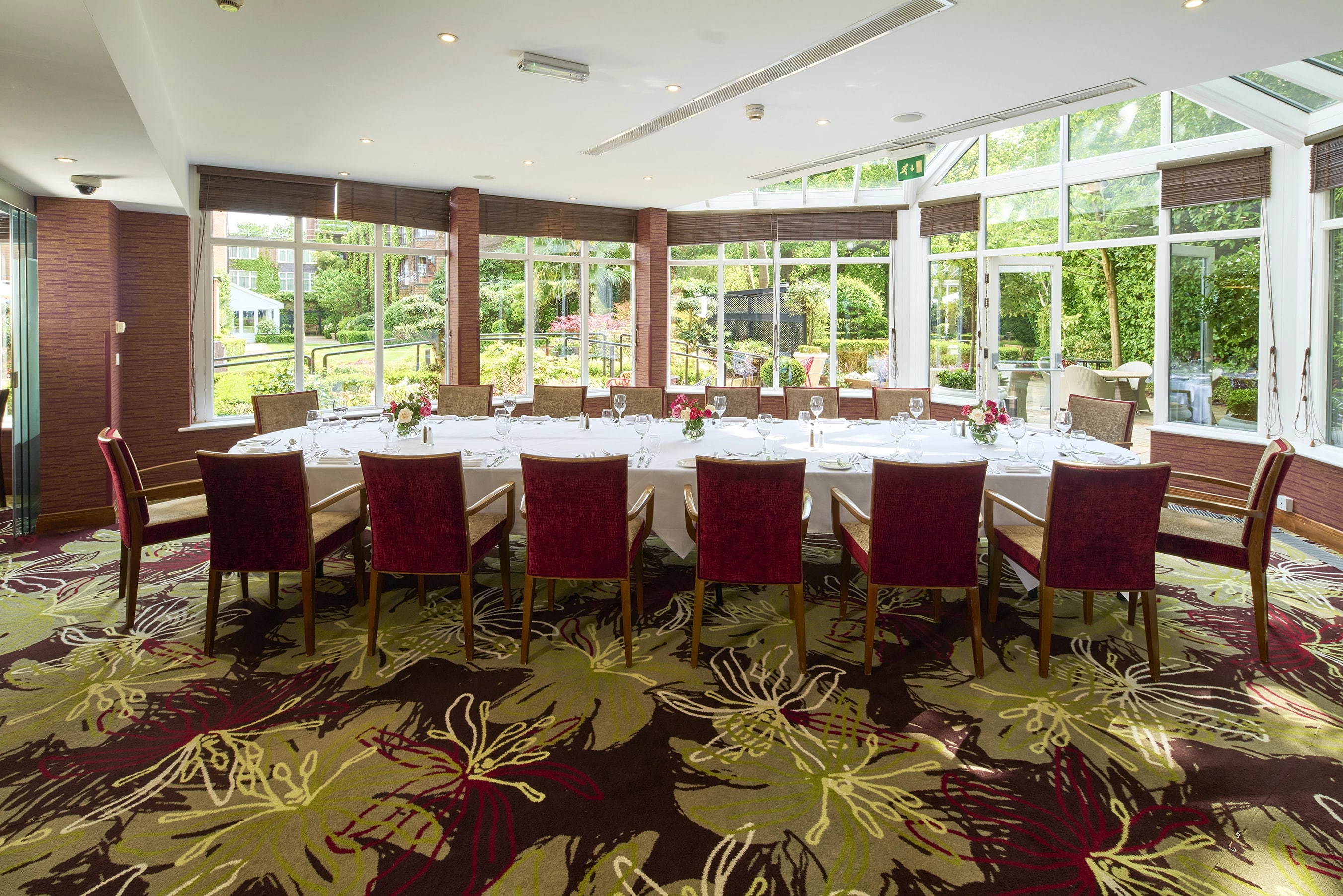 Garden Room at The Bull Hotel: elegant meeting space with natural light for corporate events.