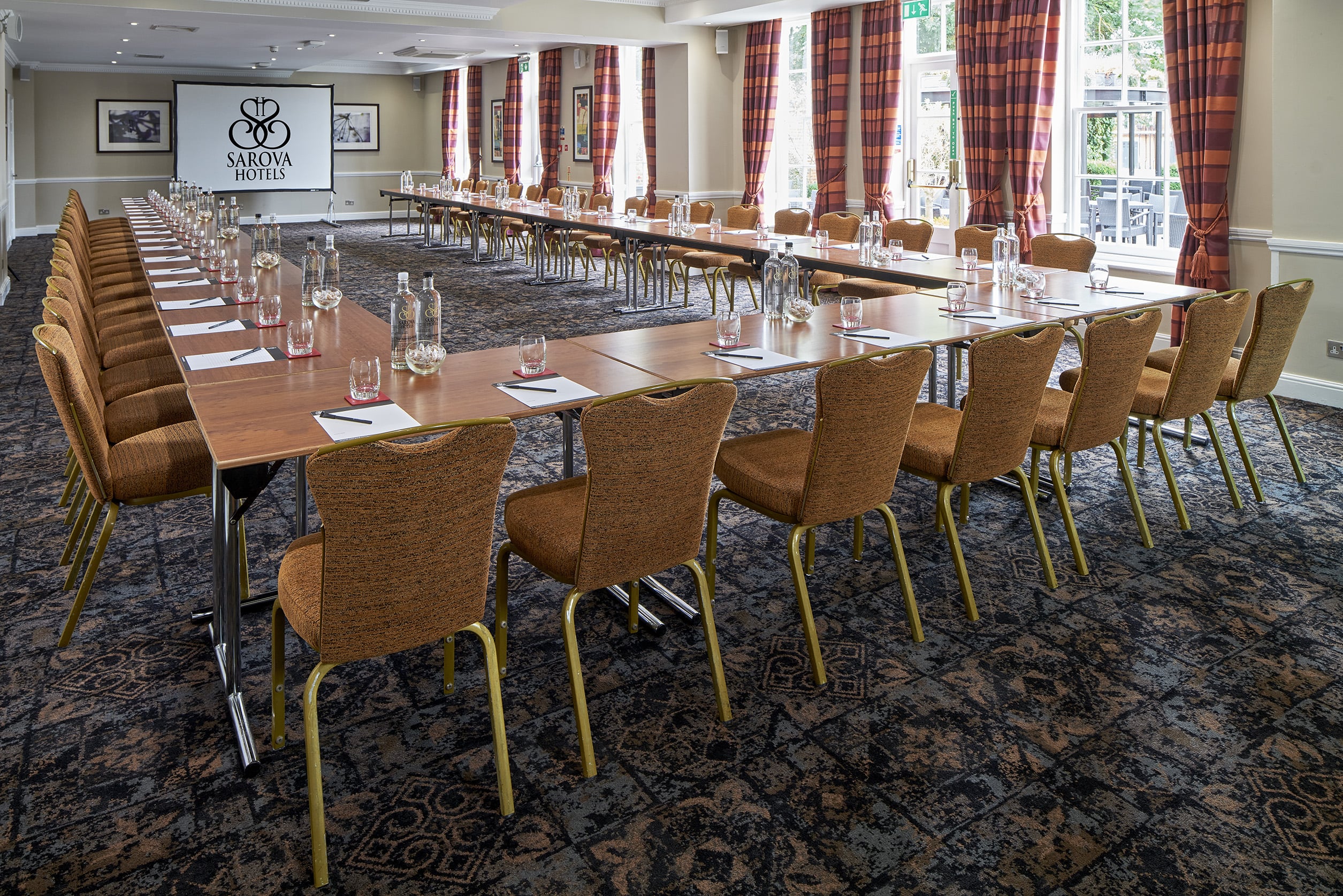 Princess Suite meeting room with U-shaped tables, perfect for corporate events and workshops.
