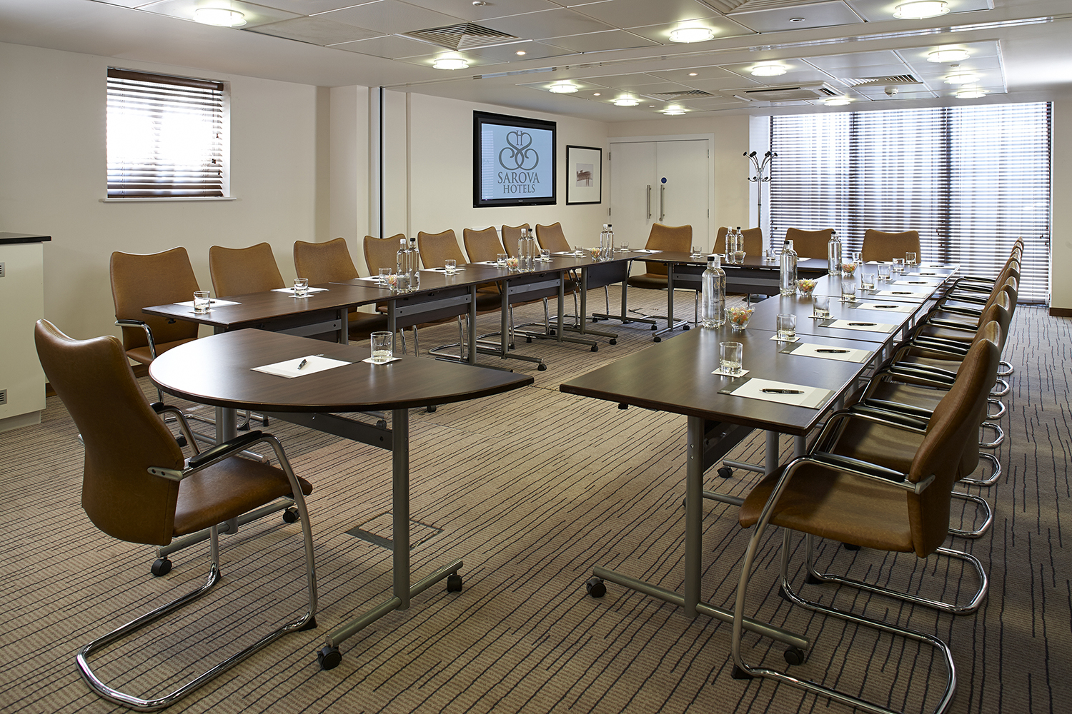 Buckingham Suite meeting room with U-shaped table, ideal for corporate events and workshops.