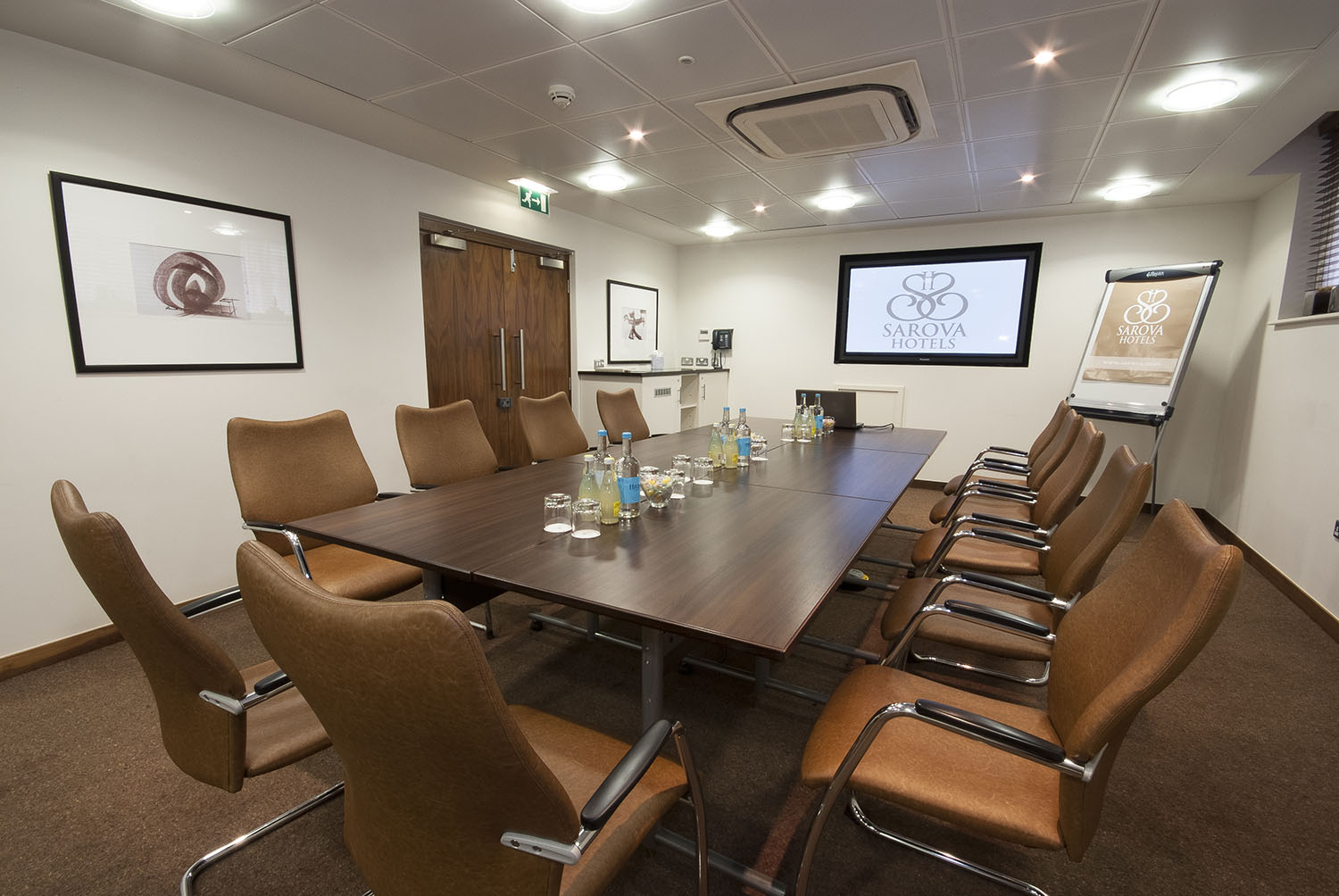 Balmoral Suite meeting room with long table, ideal for professional events and presentations.