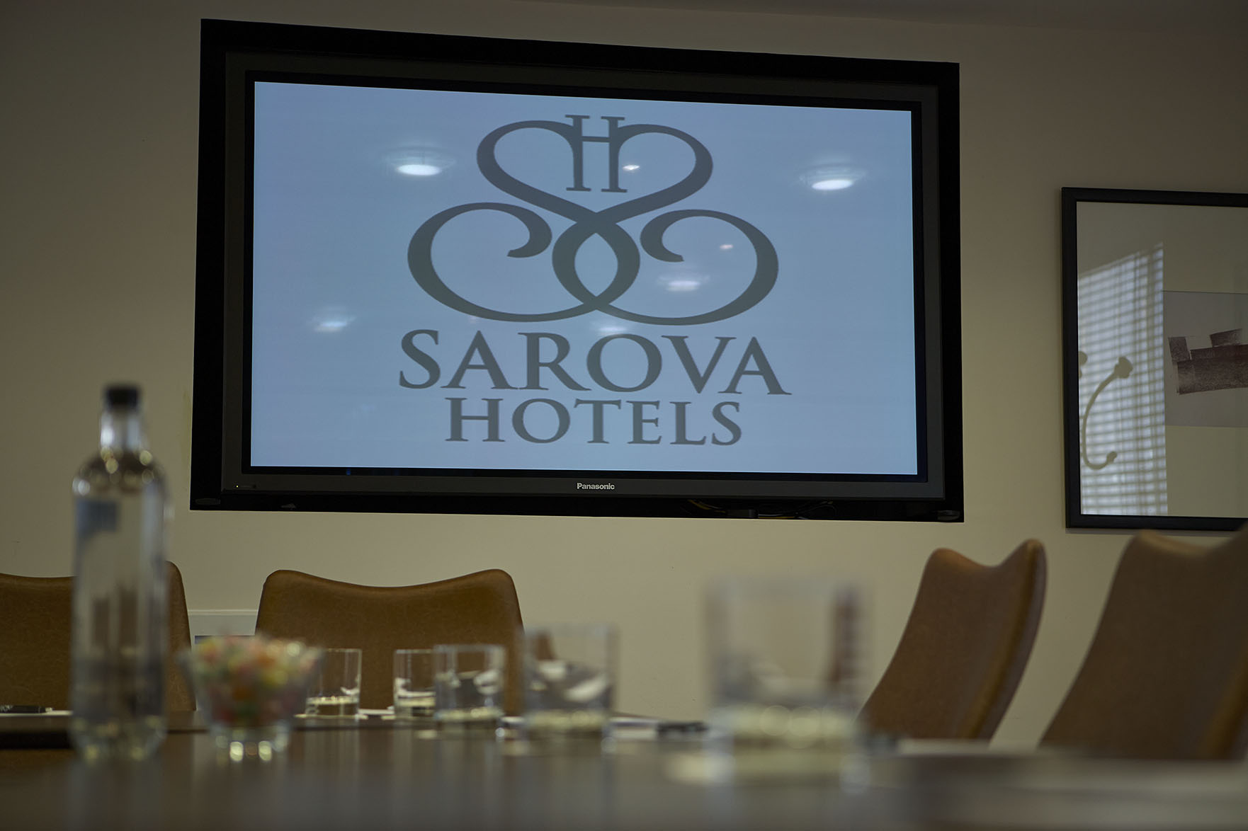 Sandringham Boardroom with polished table, ready for professional meeting or presentation.