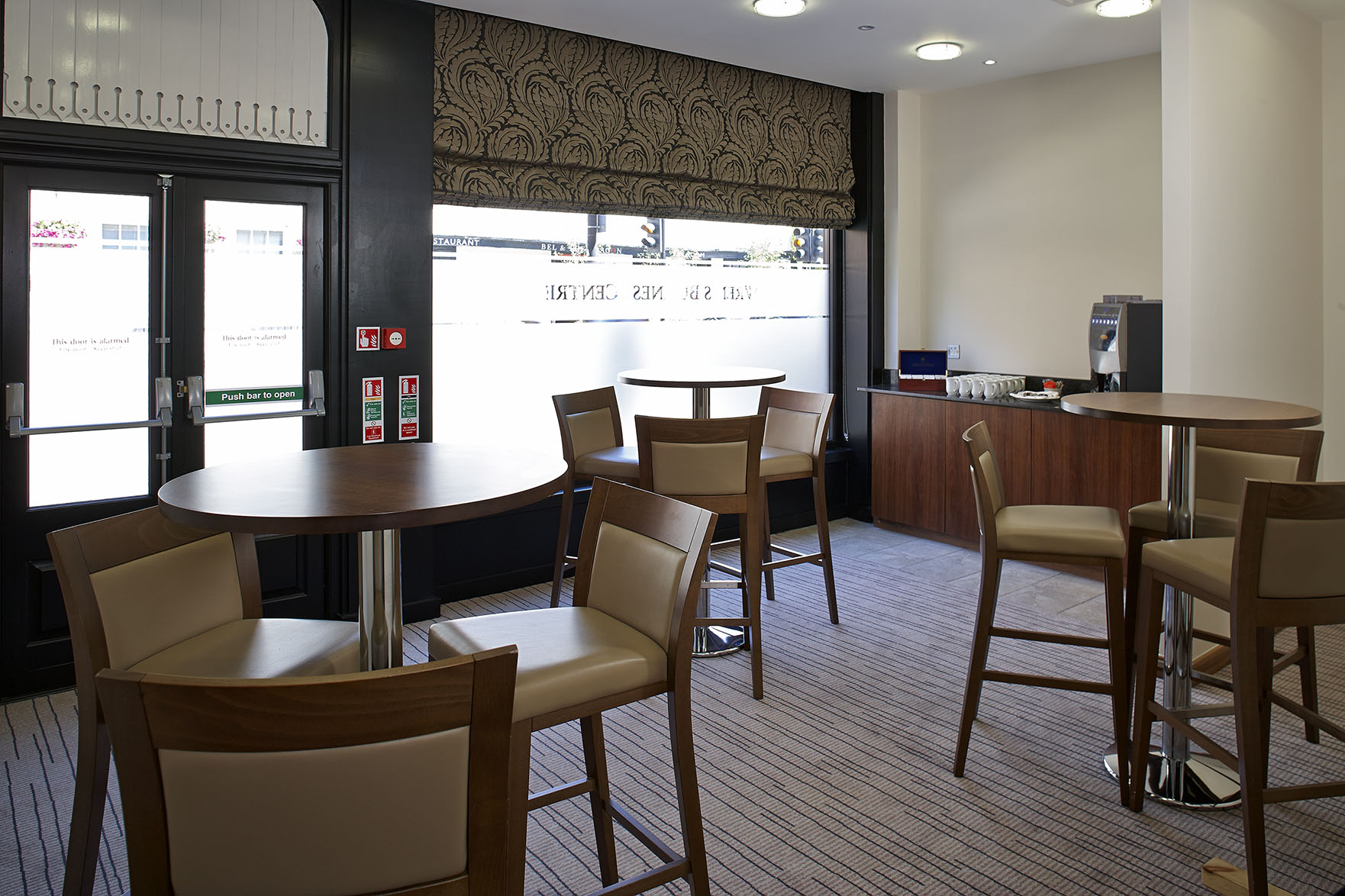 Sandringham Boardroom with high-top tables, ideal for networking events and meetings.