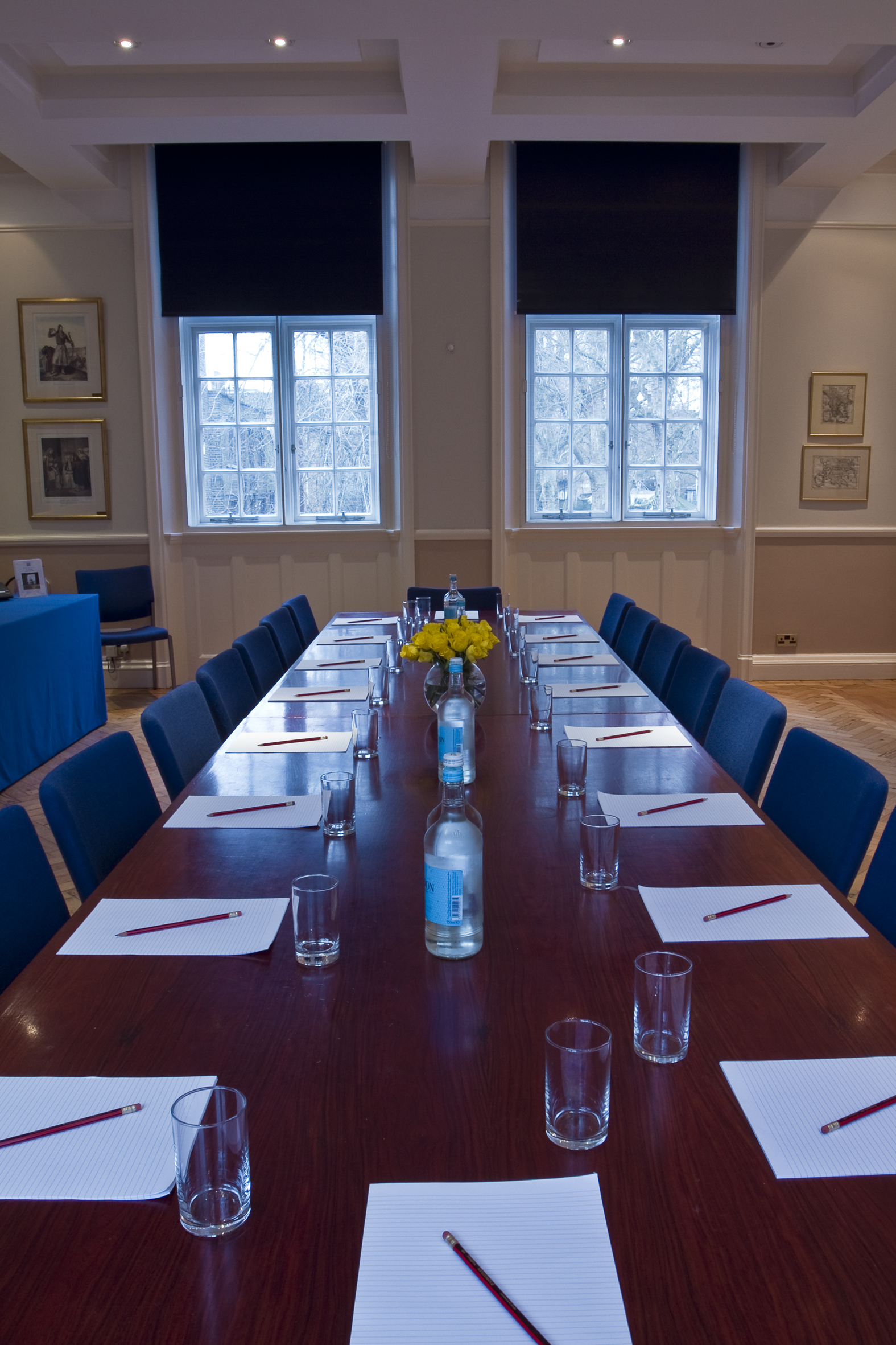 Boardroom at The Hellenic Centre with long wooden table for professional meetings.
