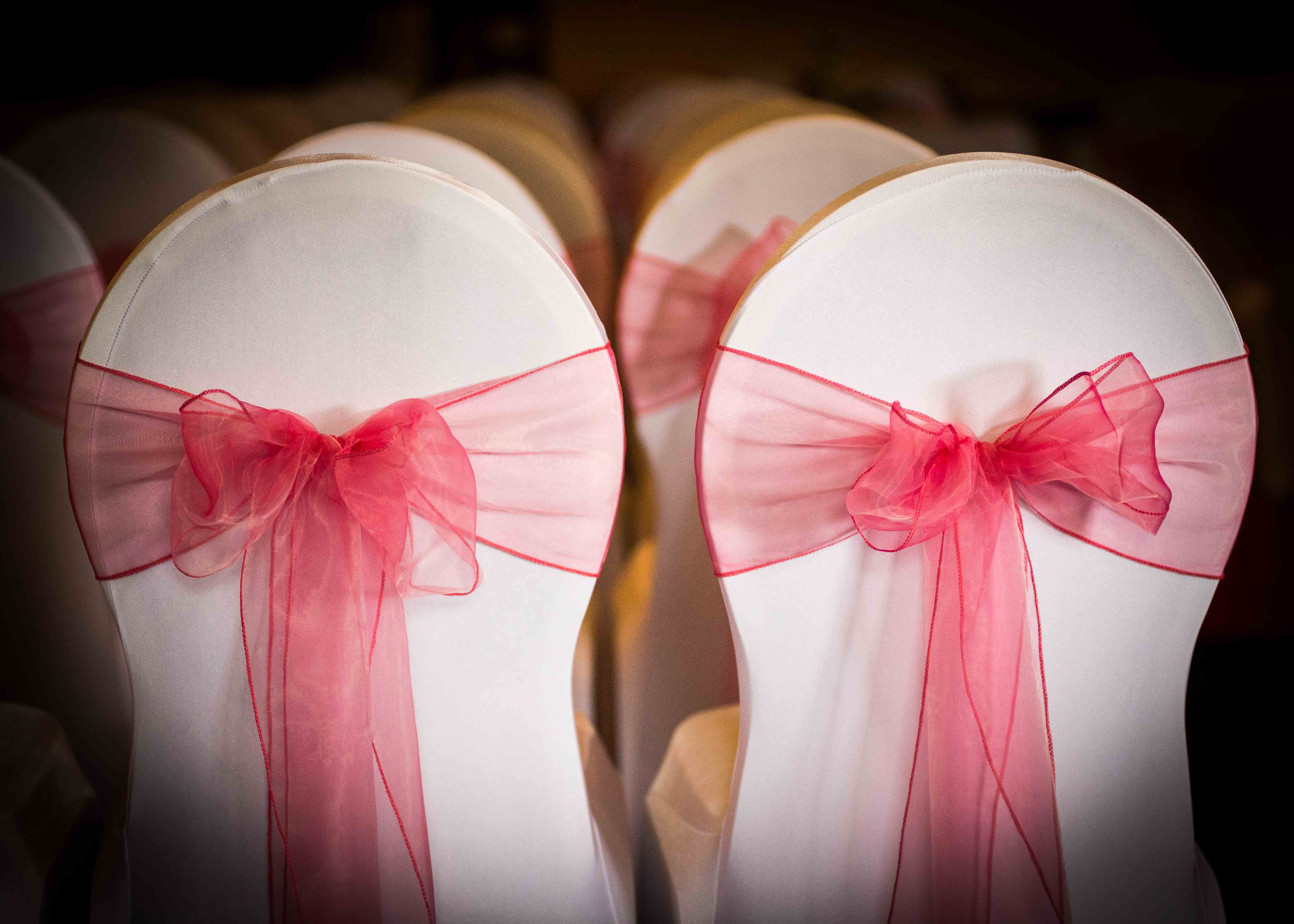 Shaw Suite at The Abbey Hotel with pink-sashed chair covers for weddings and events.