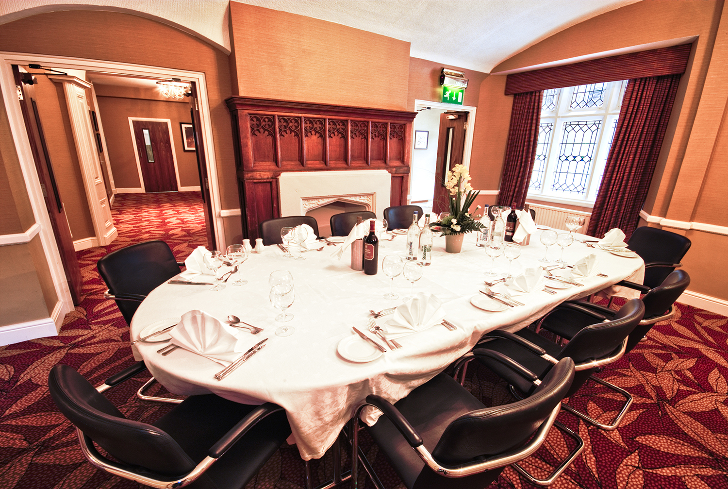 Hereford Suite meeting room with oval table, ideal for intimate corporate events.