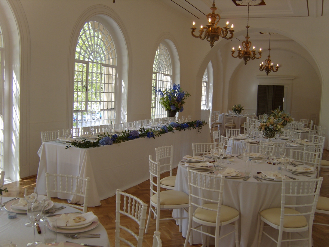 Elegant event space at One Marylebone with floral centerpieces, ideal for weddings.