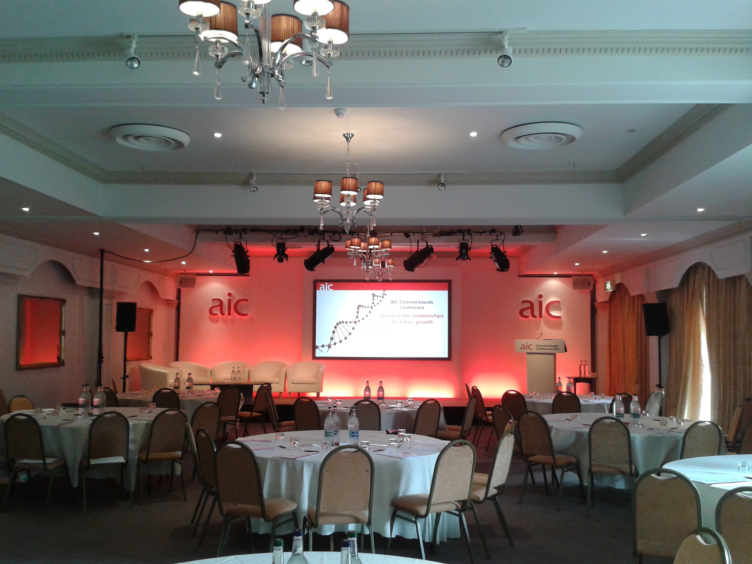 La Seigneurie Suite with round tables, ideal for corporate meetings and conferences.