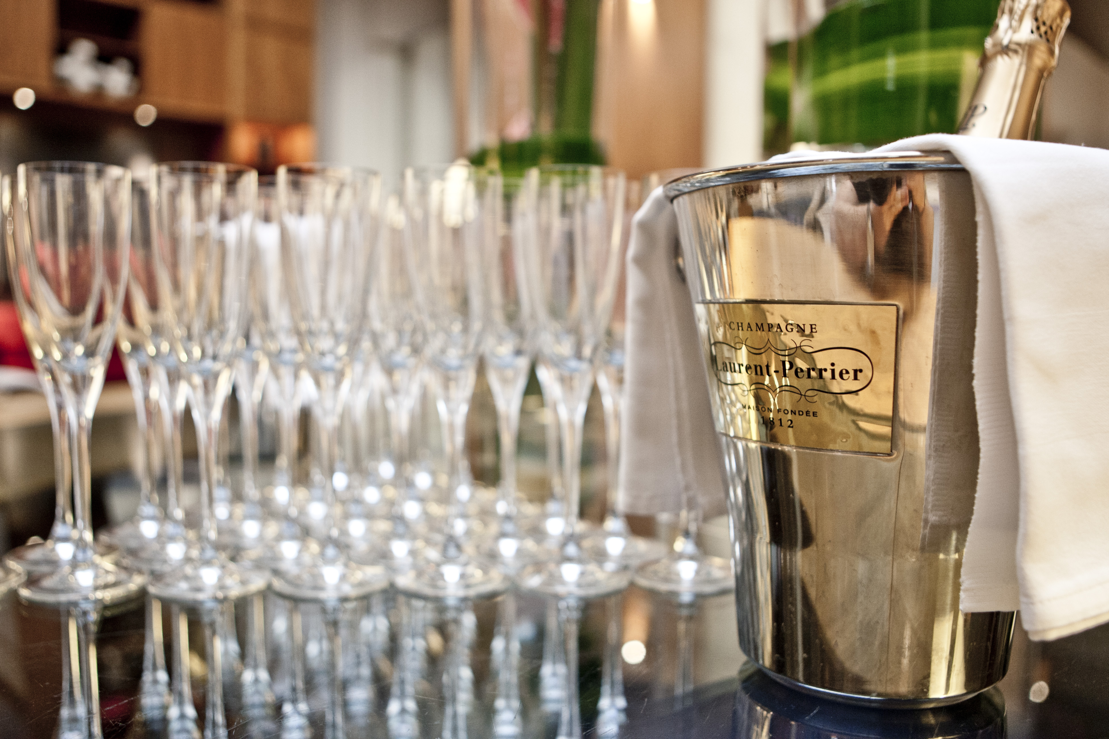 Elegant Dome Lounge setup with champagne flutes for corporate events in Threadneedles Hotel.