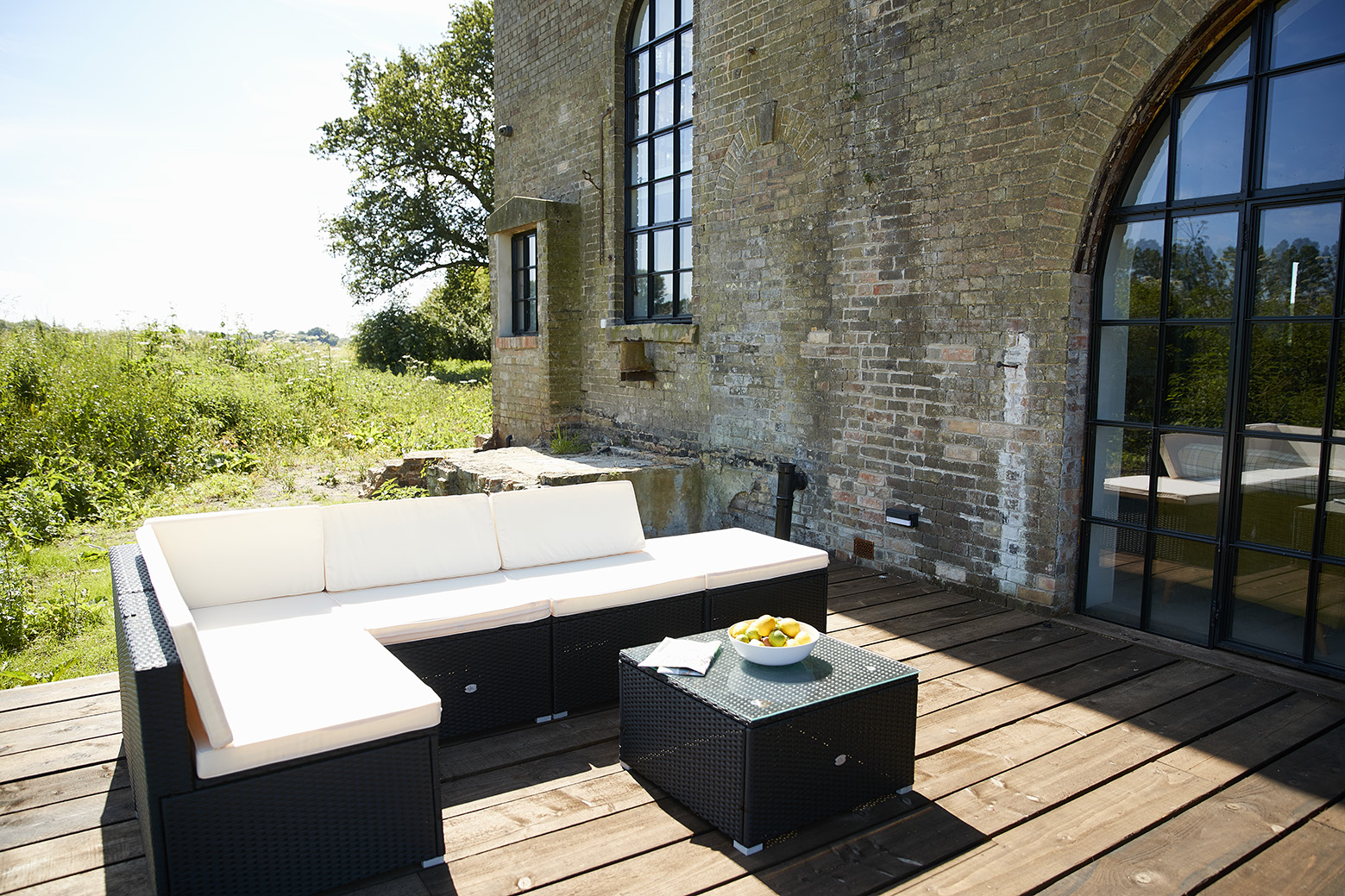 Stylish outdoor lounge at The Pumphouse, perfect for networking and casual meetings.