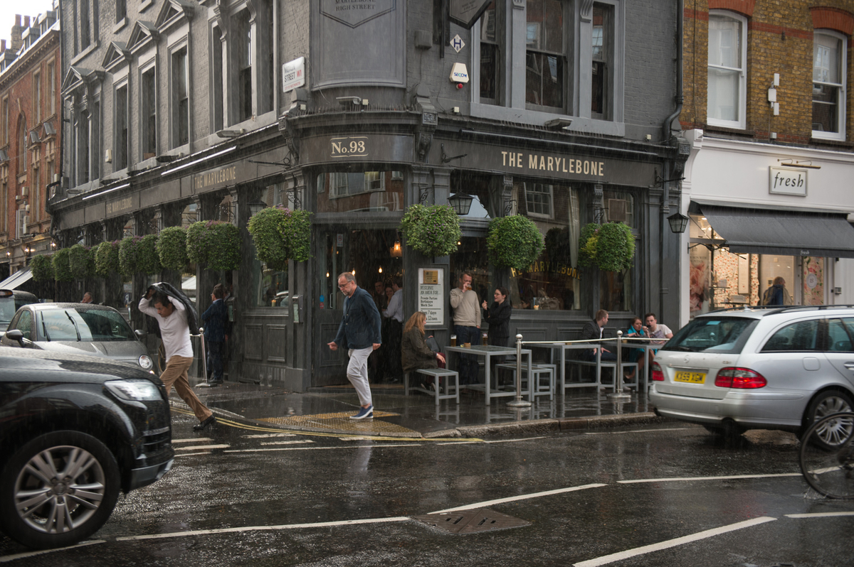 The Bar in The Marylebone: bustling outdoor venue with greenery for events and gatherings.