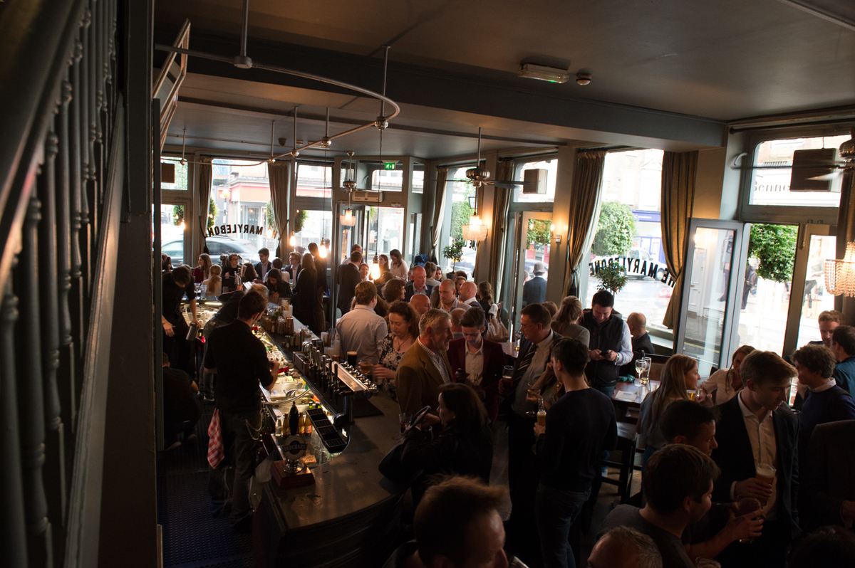 Networking event at The Bar in The Marylebone, featuring a lively atmosphere and natural light.