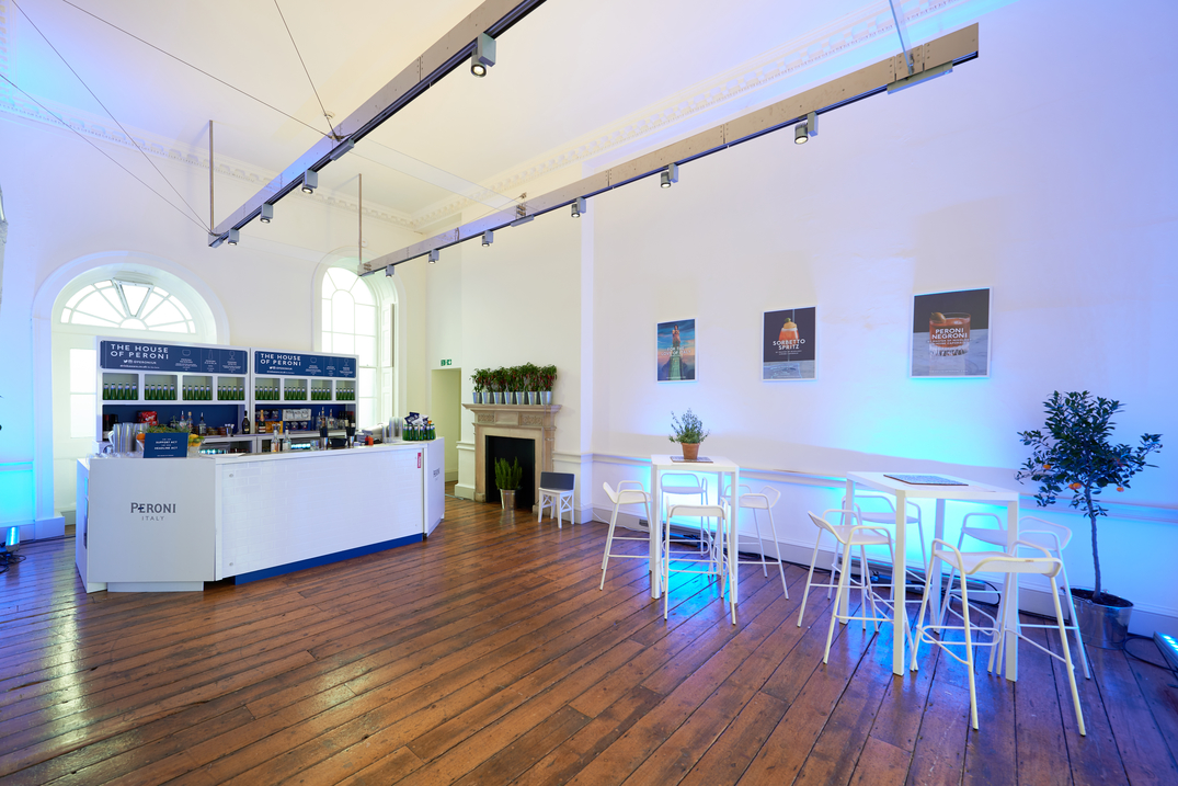 East Wing at Somerset House: modern event space with sleek bar, ideal for networking and receptions.