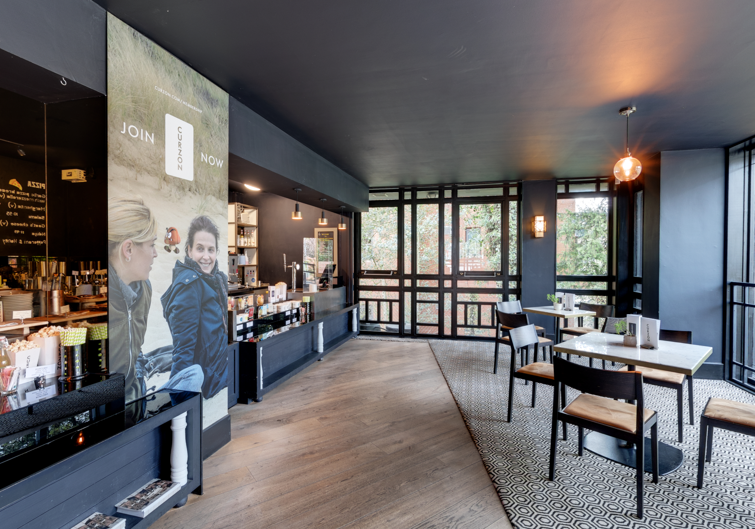 Modern meeting space in Curzon Knutsford with cozy lighting for networking events.