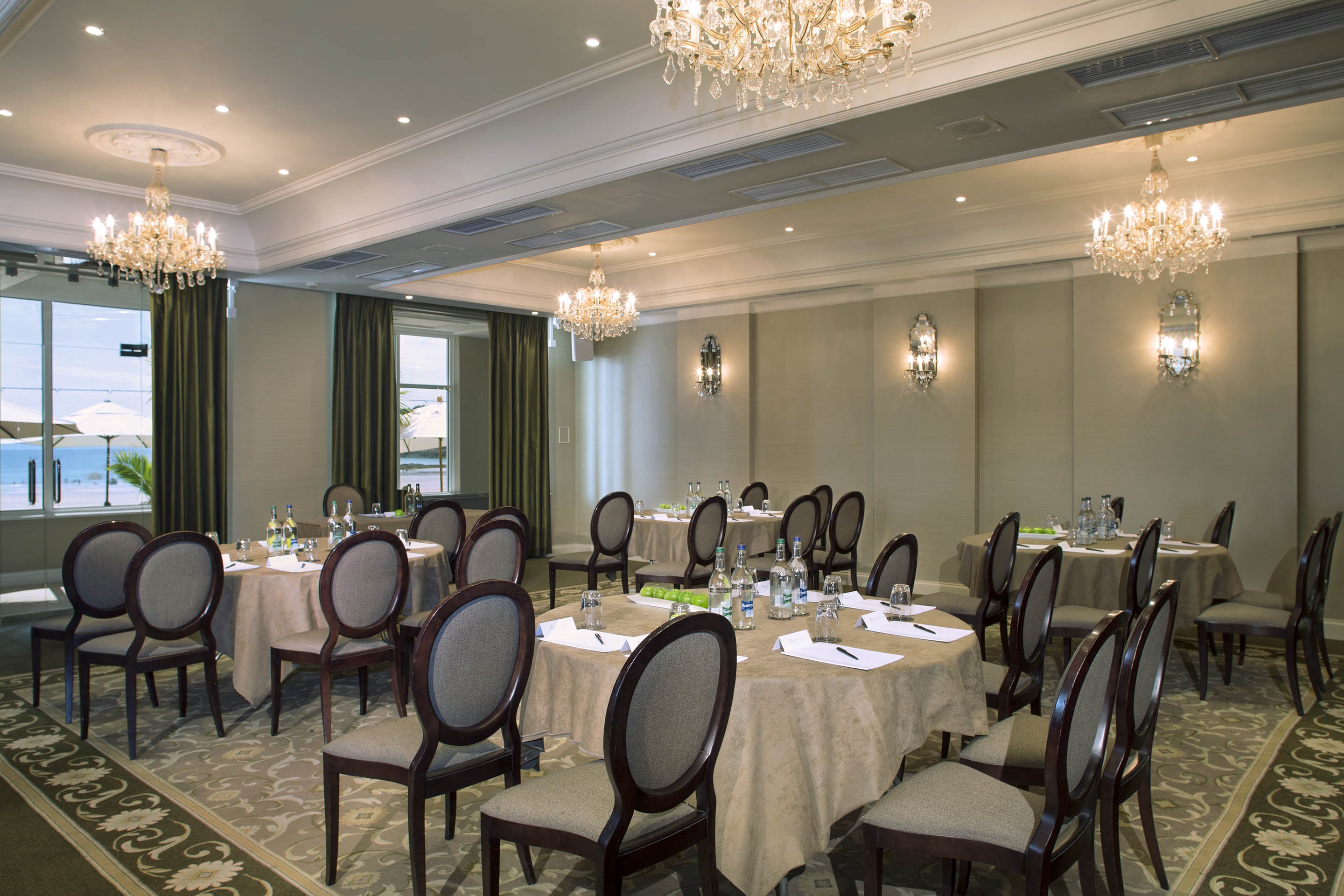 Elegant meeting room at L'Horizon Beach Hotel, perfect for corporate events and workshops.