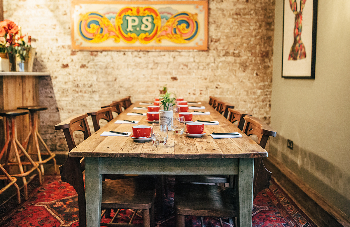 Rustic dining setup in Club Room, Artist Residence London for intimate meetings and events.