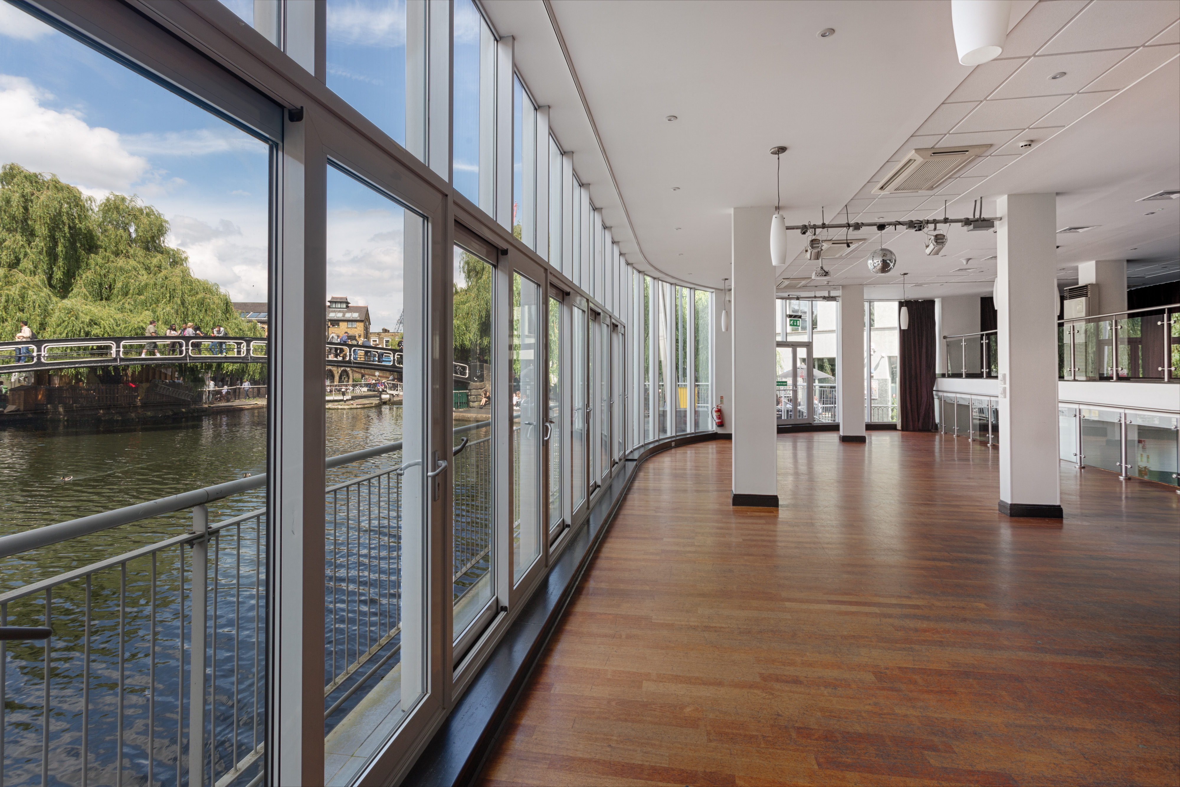 Spacious event space at Holiday Inn Camden Lock with scenic water views and natural light.