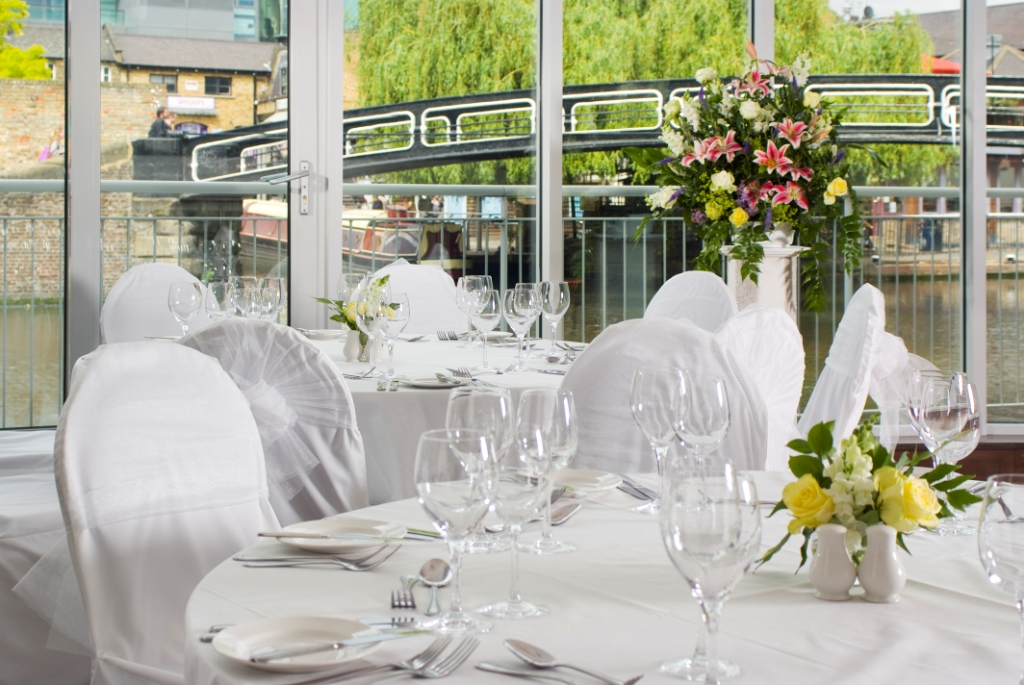 Elegant dining area at The Glasshouse, perfect for weddings and upscale events.