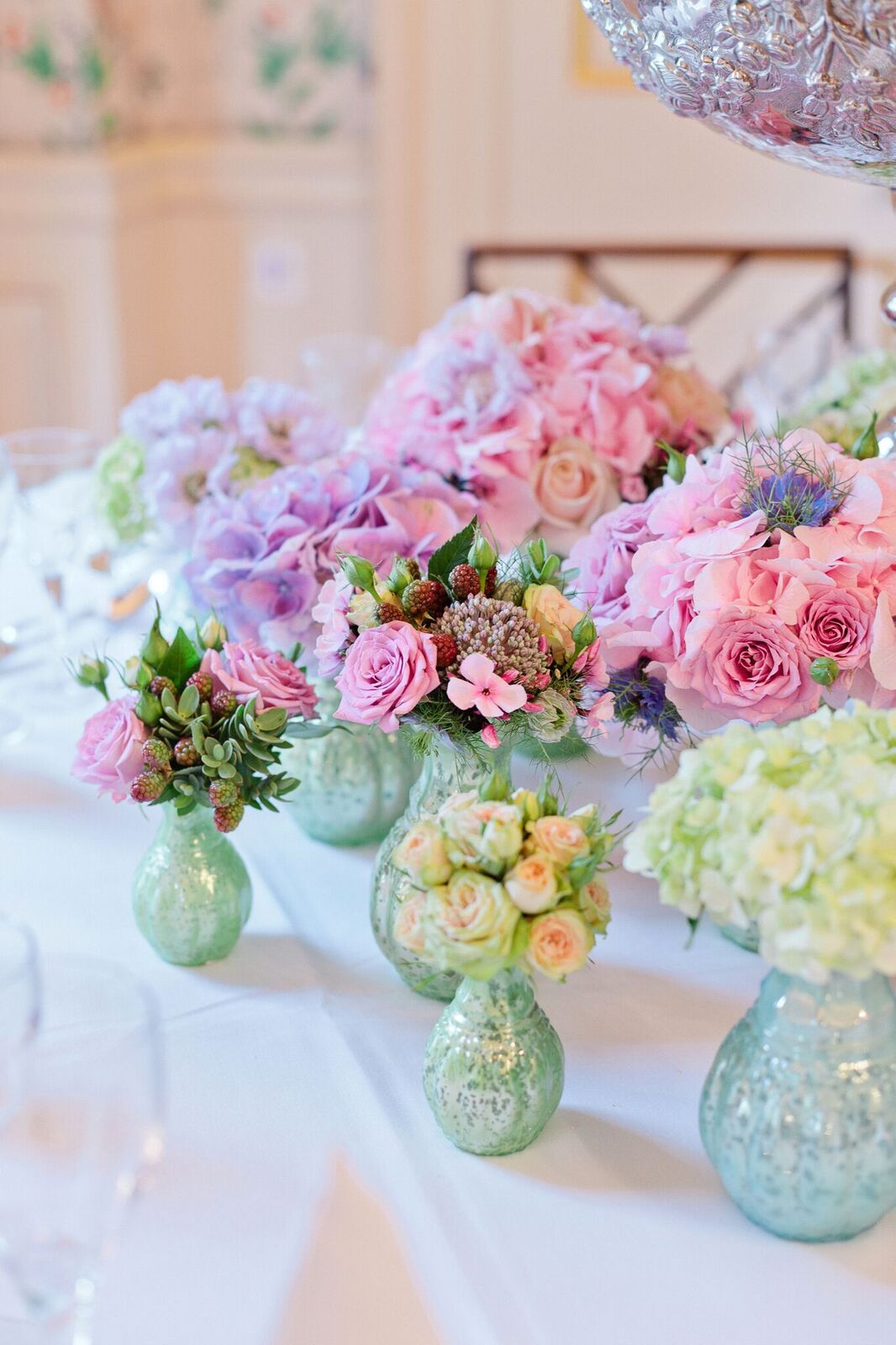 Pastel flower centerpiece in Merchant Taylors' Hall for weddings and upscale events.
