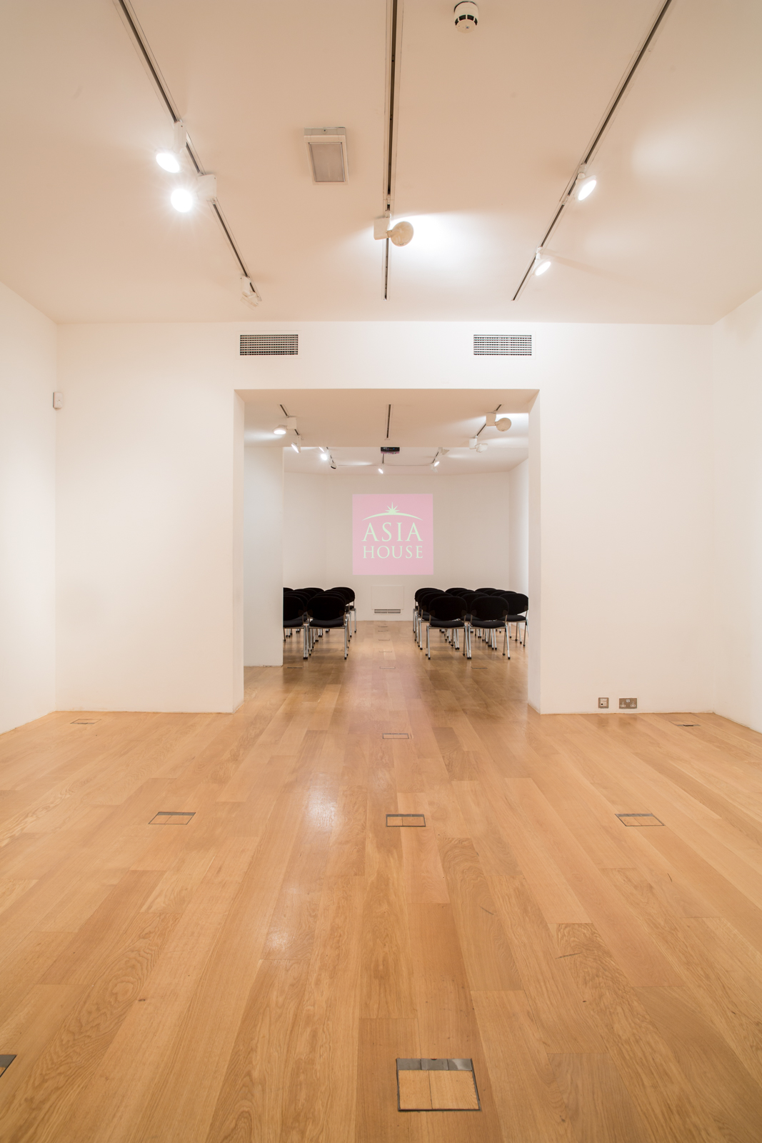Versatile meeting space in Asia House, ideal for corporate events and workshops.