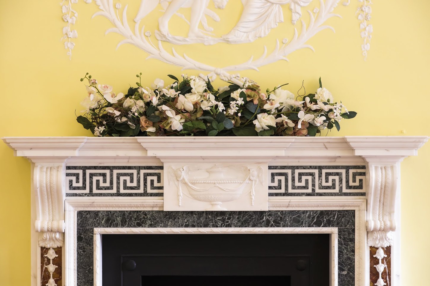 Elegant fireplace in Hutchison Room, Asia House, ideal for upscale events and gatherings.