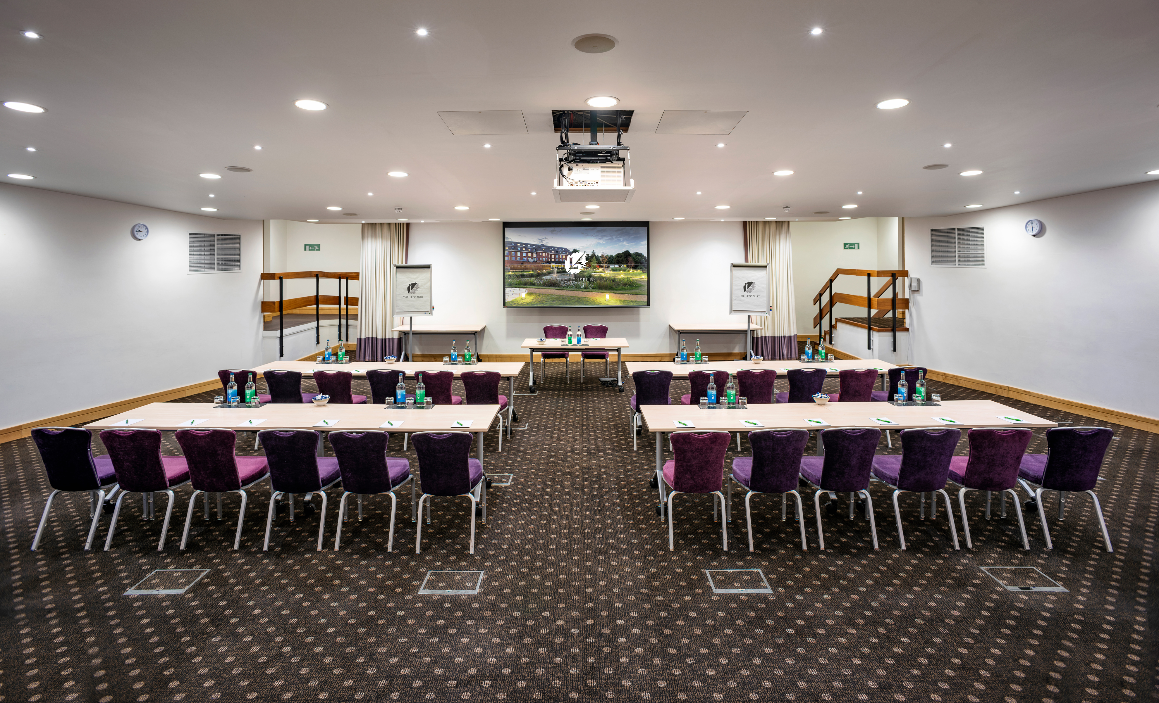 Beaumont Room at The Lensbury, U-shaped tables for conferences and workshops.