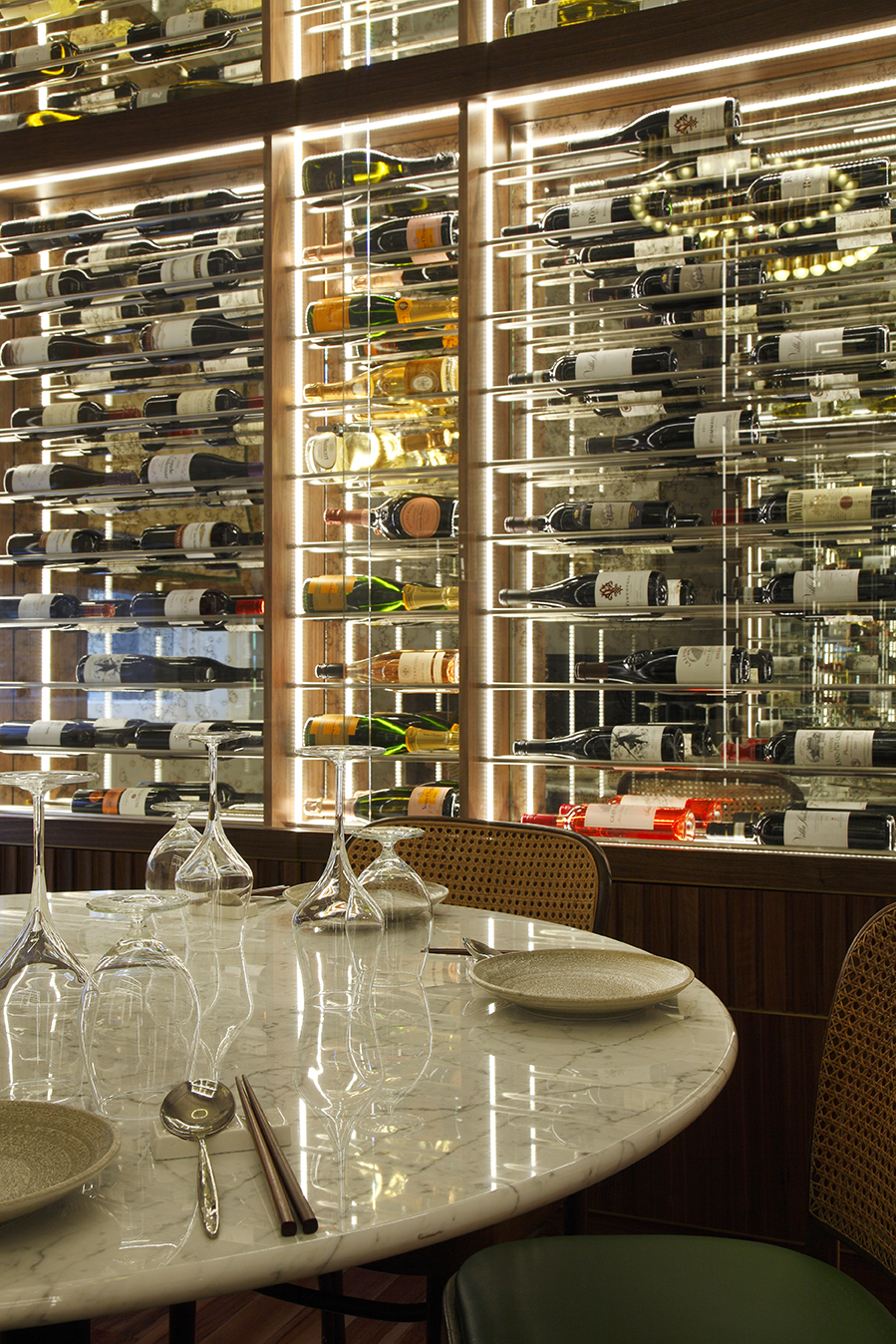 Sophisticated wine display in upscale dining room for fine dining events.