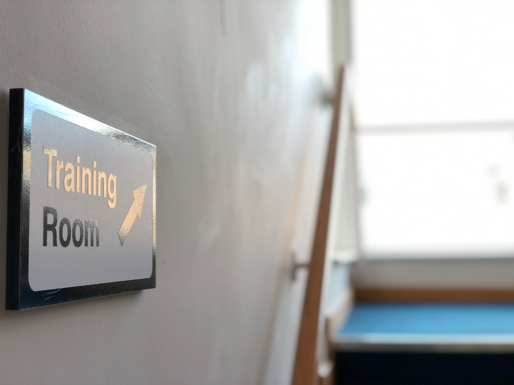 Training room sign in Endeavour House, ideal for corporate workshops and training sessions.