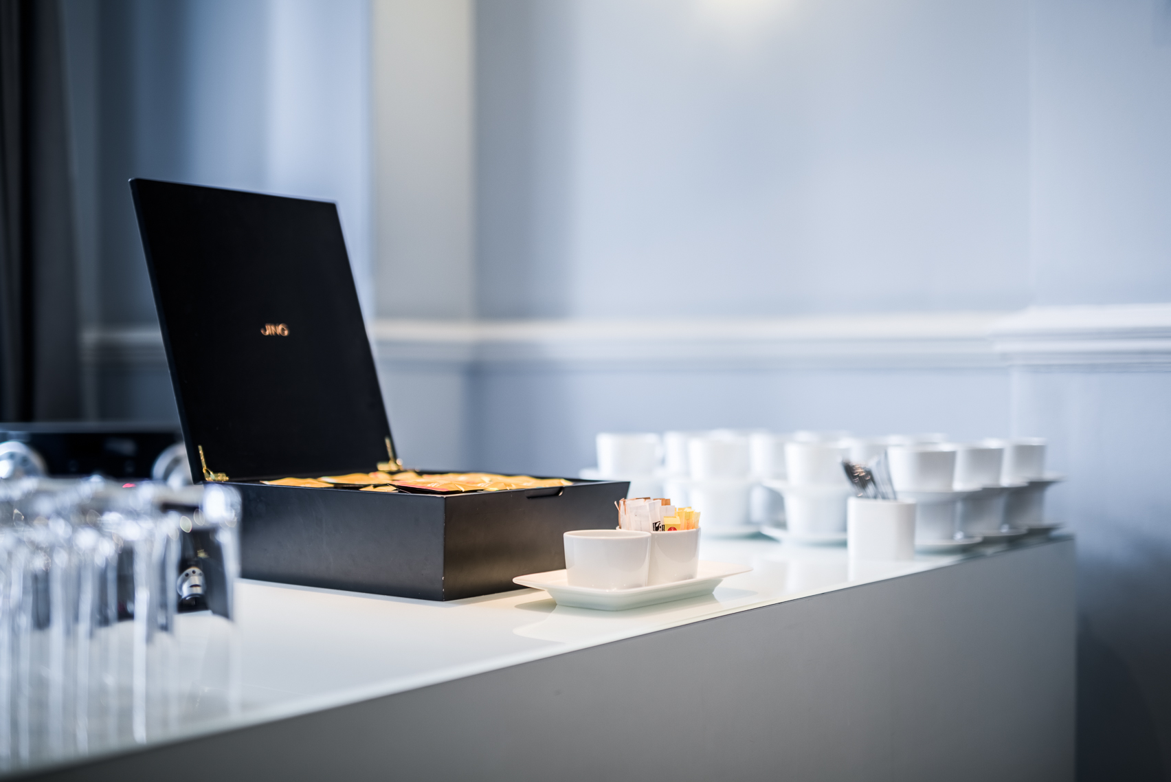 Modern meeting setup at The Minories, Andaz London with gourmet snacks and elegant design.
