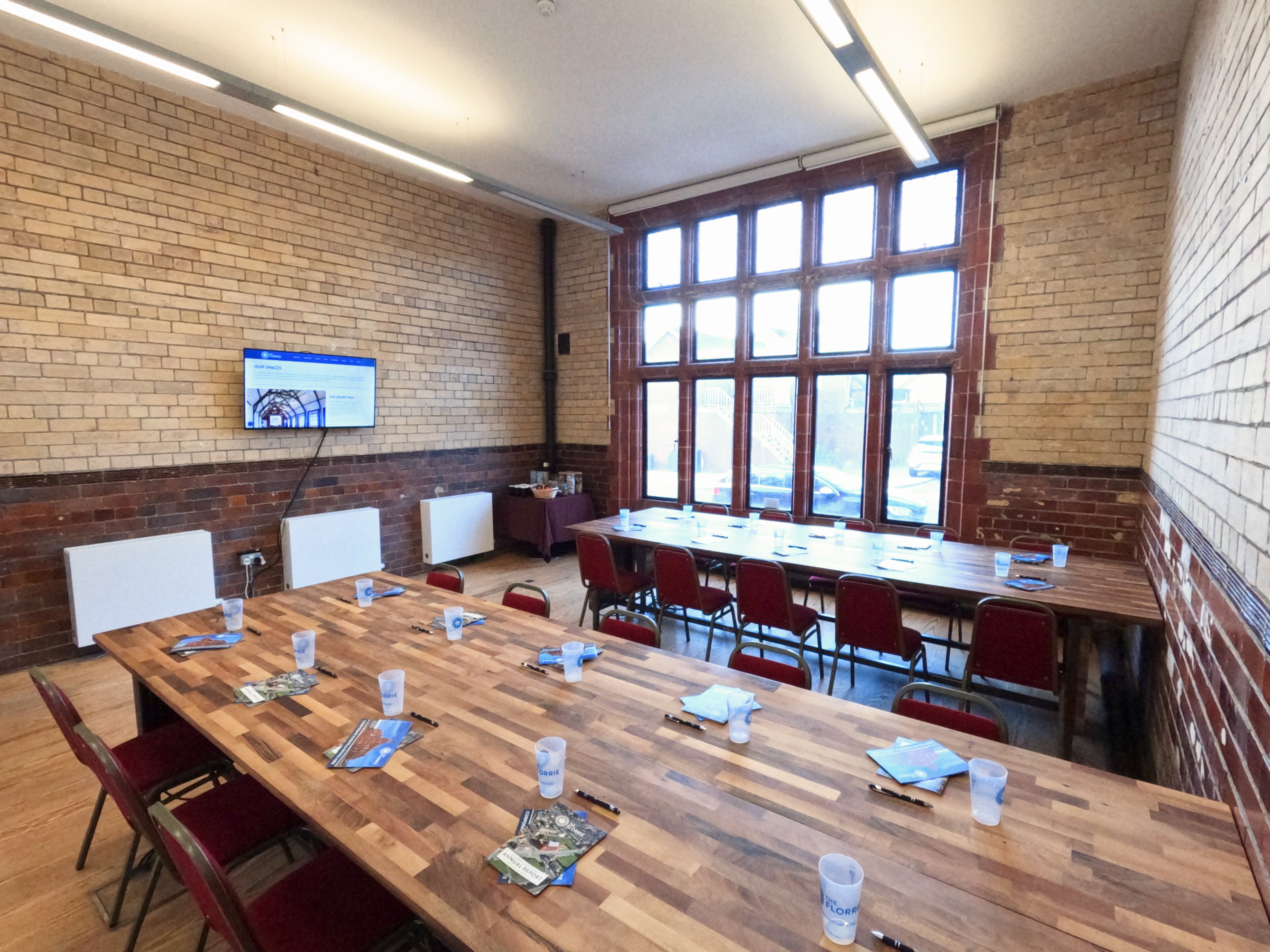 Meeting room at The Florrie with wooden table, ideal for workshops and team meetings.