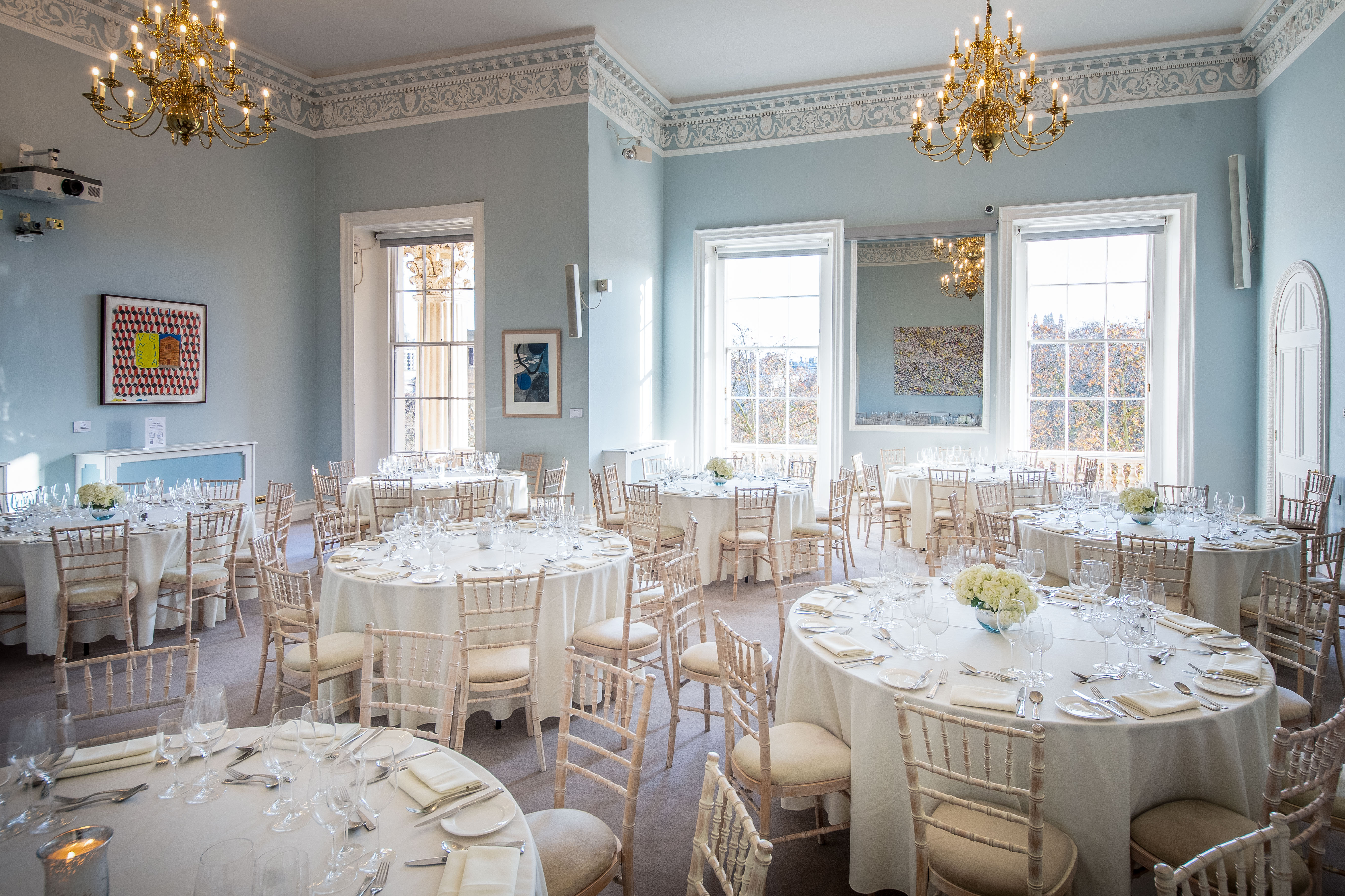 Beatrice Webb Room with elegant round tables, ideal for weddings and corporate events.