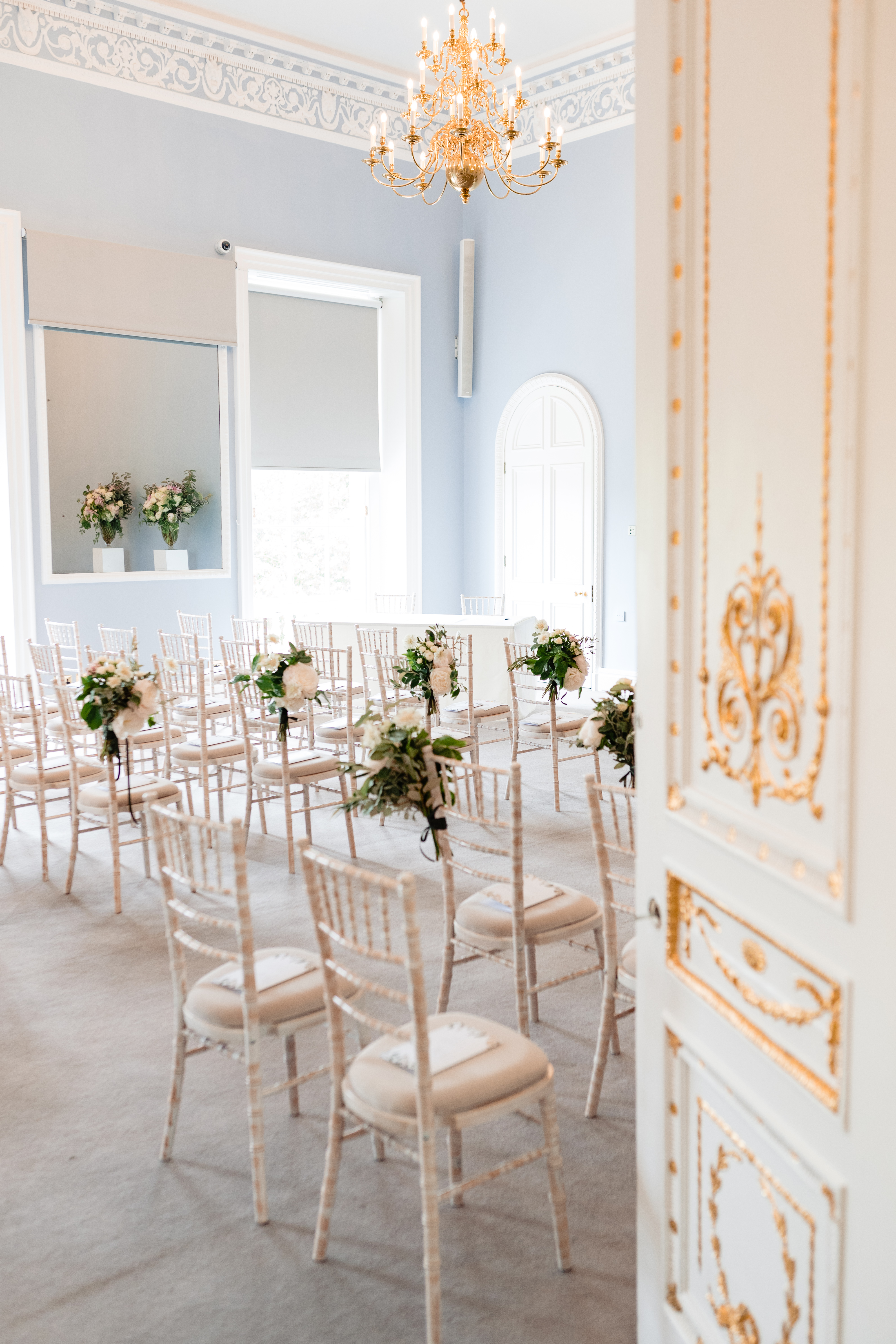Beatrice Webb Room: elegant wedding venue with floral chairs and natural light.