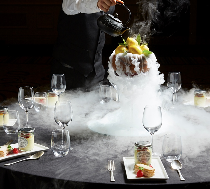Elegant dessert centerpiece with smoke effects at Westminster Ballroom, upscale event setting.