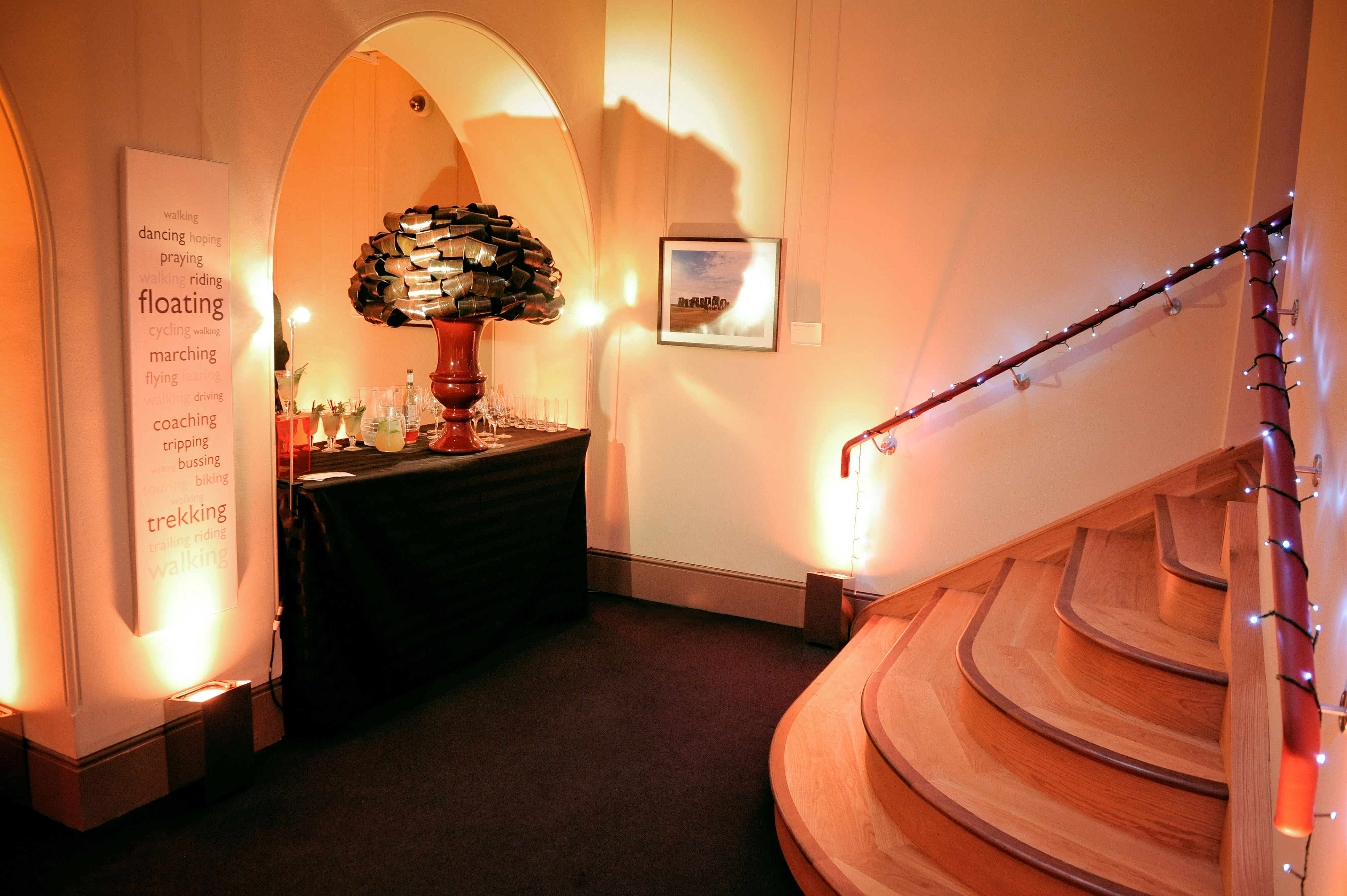 Stylish event space in Quadriga Gallery with elegant bar and warm lighting for gatherings.